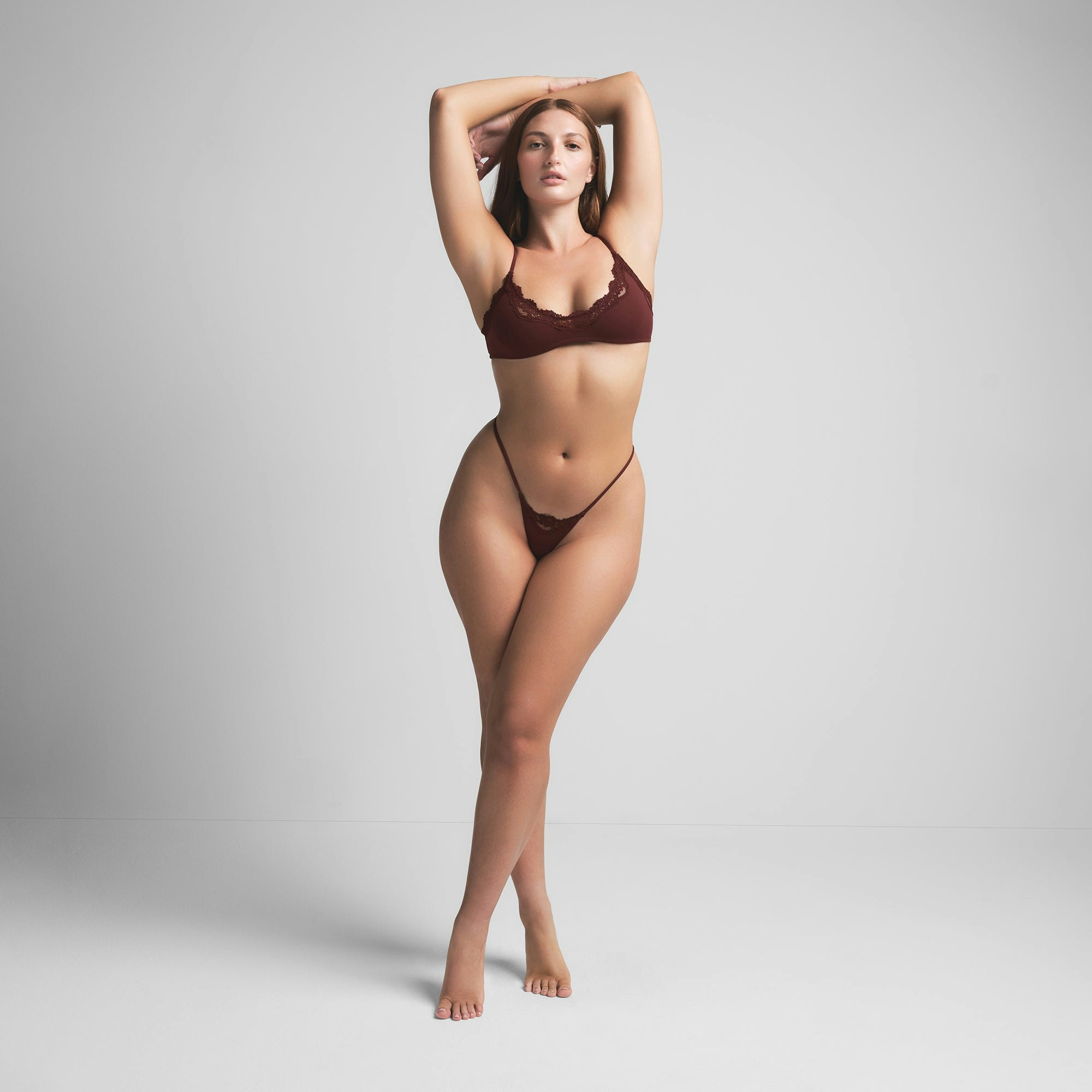 FITS EVERYBODY LACE STRING THONG | OXBLOOD ON A MODEL FRONT VIEW | FOCUS: 0.0, 1.0, 0.9