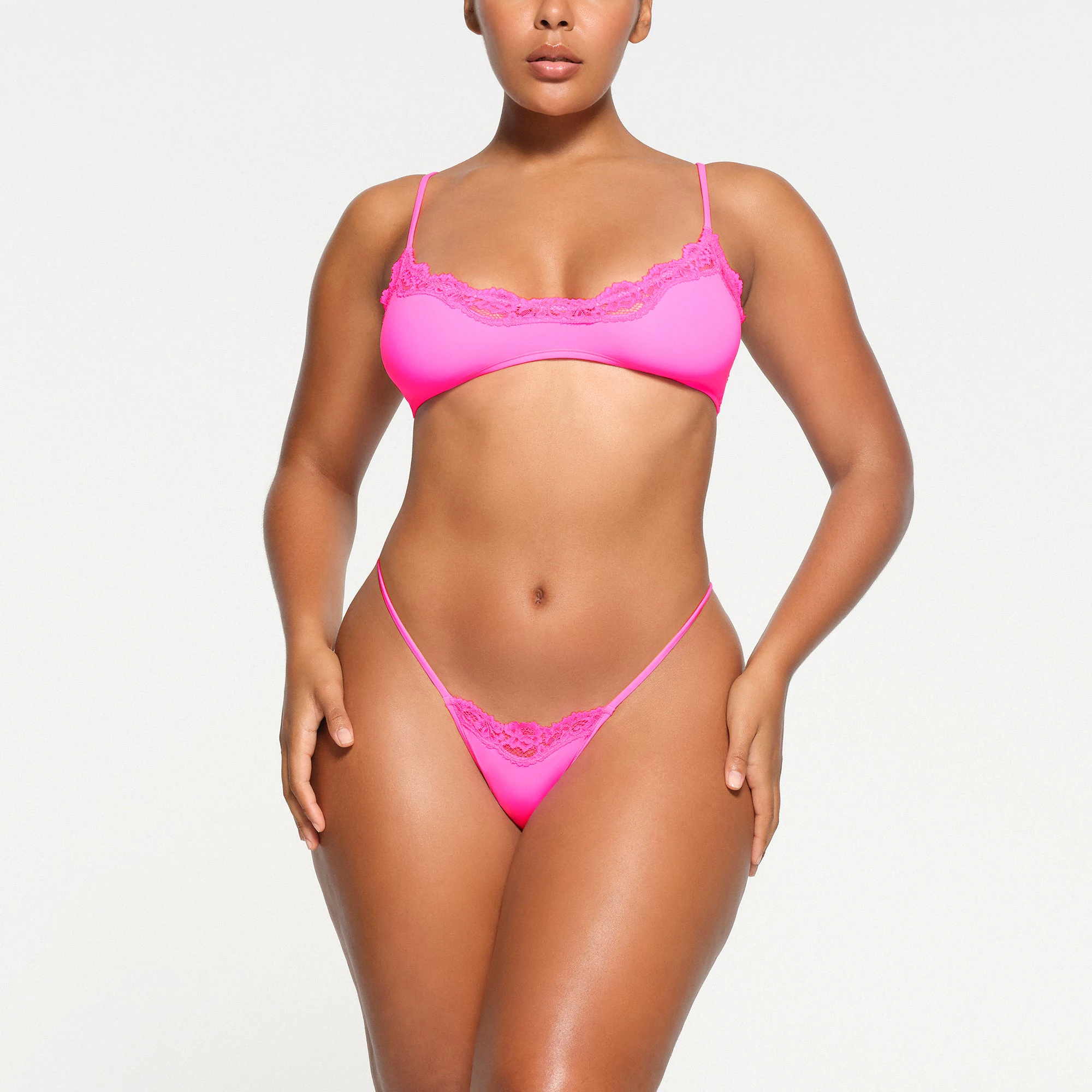 FITS EVERYBODY LACE STRING THONG | TAFFY MULTI ON A MODEL FRONT VIEW