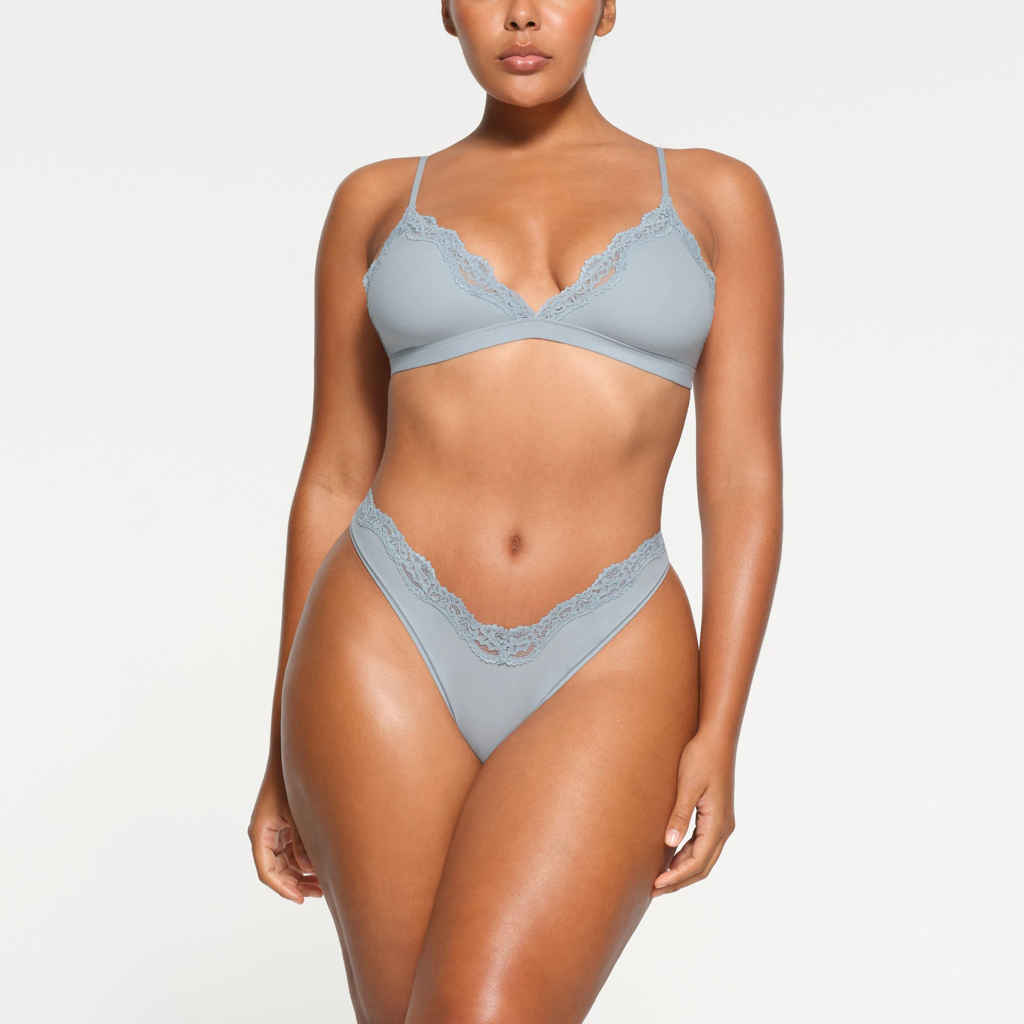 FITS EVERYBODY LACE DIPPED THONG | DENIM ON A MODEL FRONT VIEW