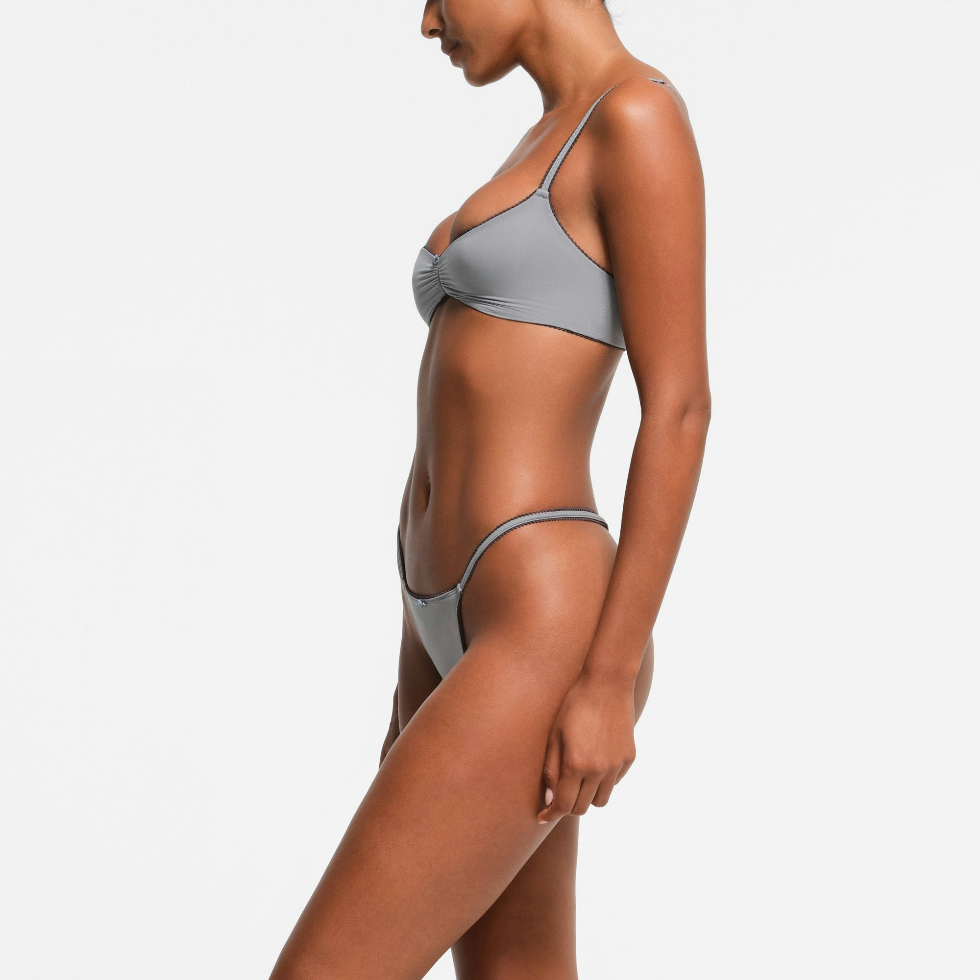 FITS EVERYBODY PICOT TRIM STRING THONG | PACIFIC ON A MODEL SIDE VIEW