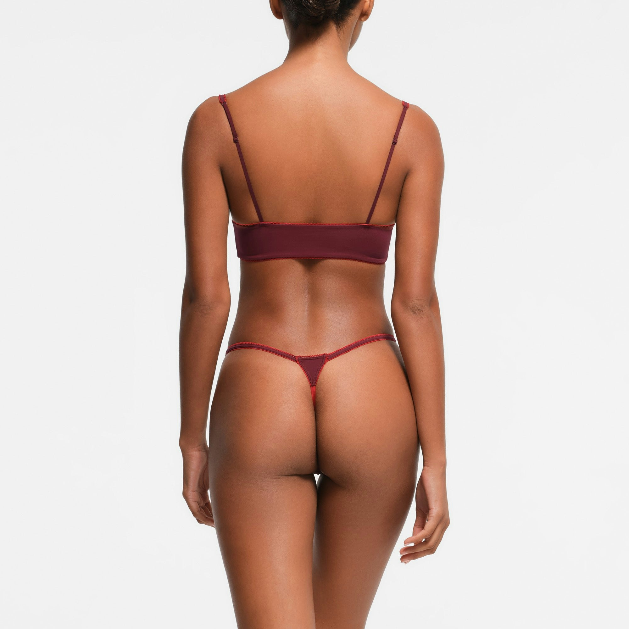FITS EVERYBODY PICOT TRIM STRING THONG | WINE CONTRAST ON A MODEL BACK VIEW