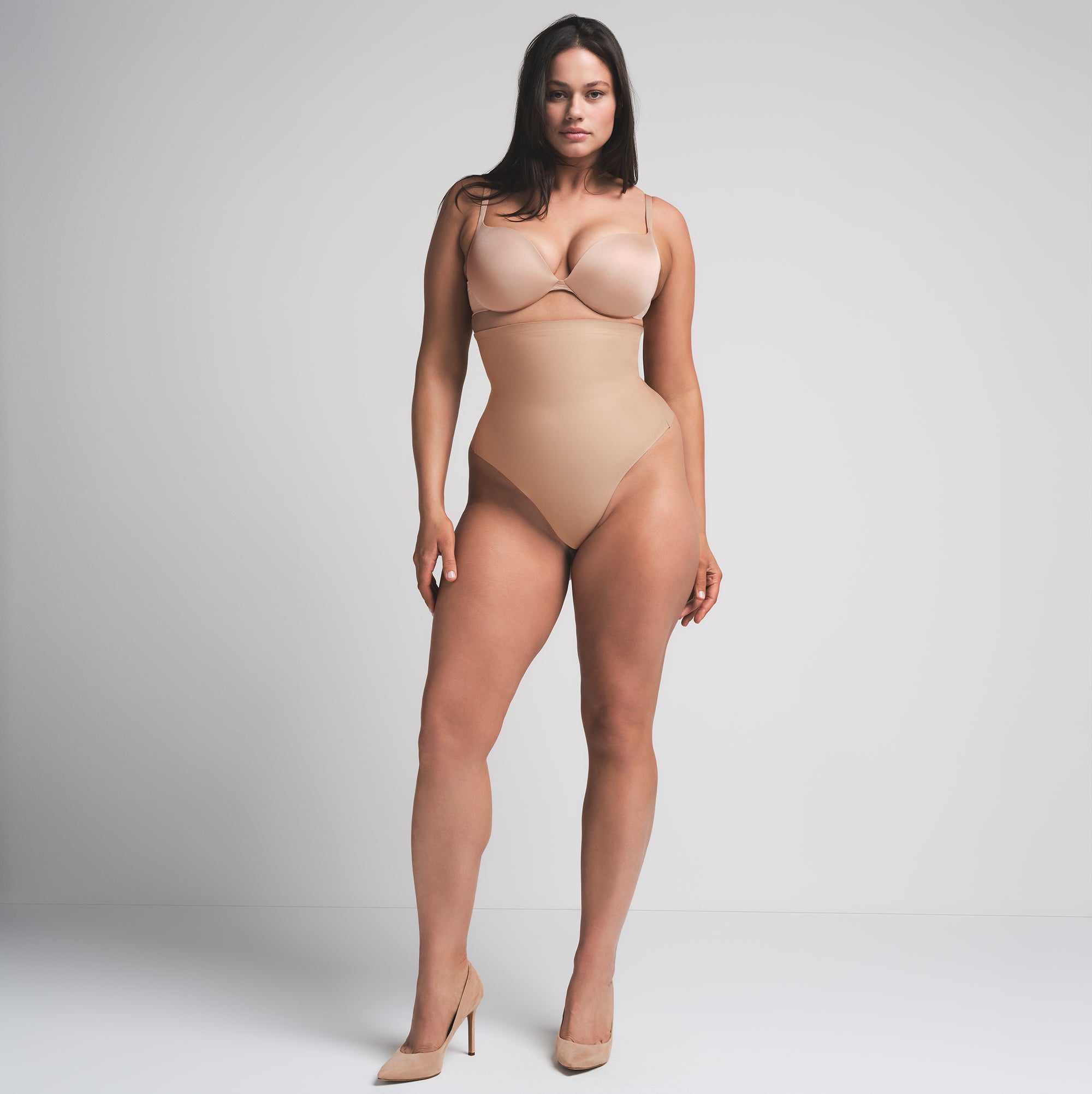 SKIMS BODY CORE SCULPT HIGH-WAISTED THONG | CLAY  ON A MODEL FRONT VIEW | FOCUS: 0.0, 1.0, 0.9
