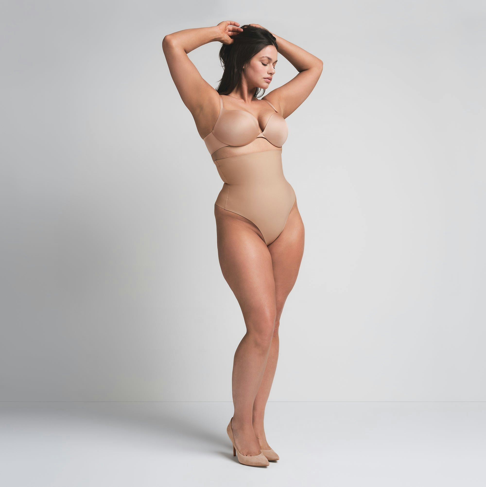 SKIMS BODY CORE SCULPT HIGH-WAISTED THONG | CLAY  ON A MODEL FRONT VIEW | FOCUS: 0.0, 1.0, 0.9