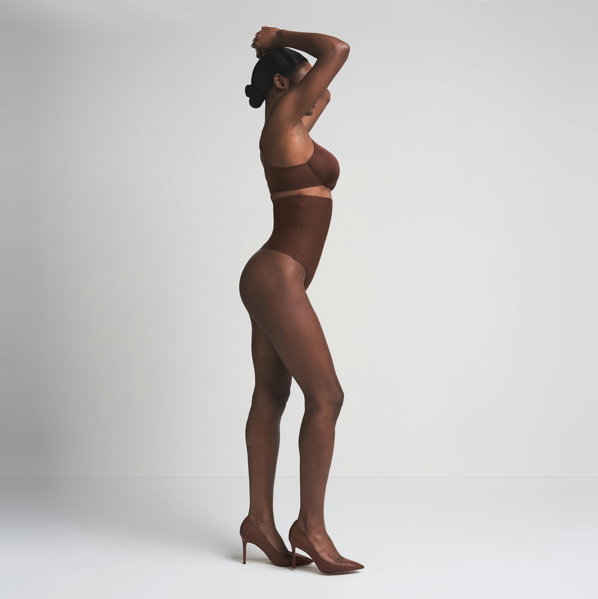 SKIMS BODY CORE SCULPT HIGH-WAISTED THONG | COCOA  ON A MODEL SIDE VIEW | FOCUS: 0.0, 1.0, 0.9