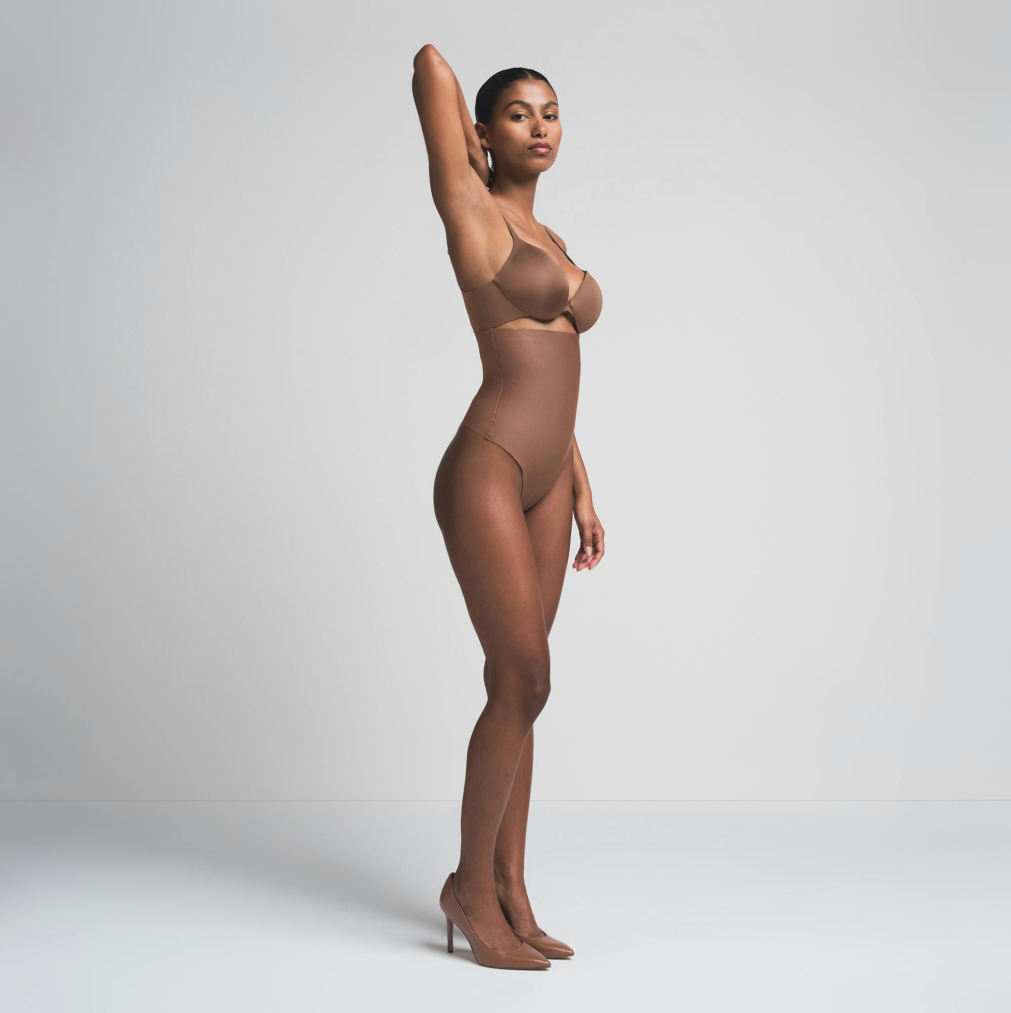 SKIMS BODY CORE SCULPT HIGH-WAISTED THONG | JASPER  ON A MODEL SIDE VIEW | FOCUS: 0.0, 1.0, 0.9