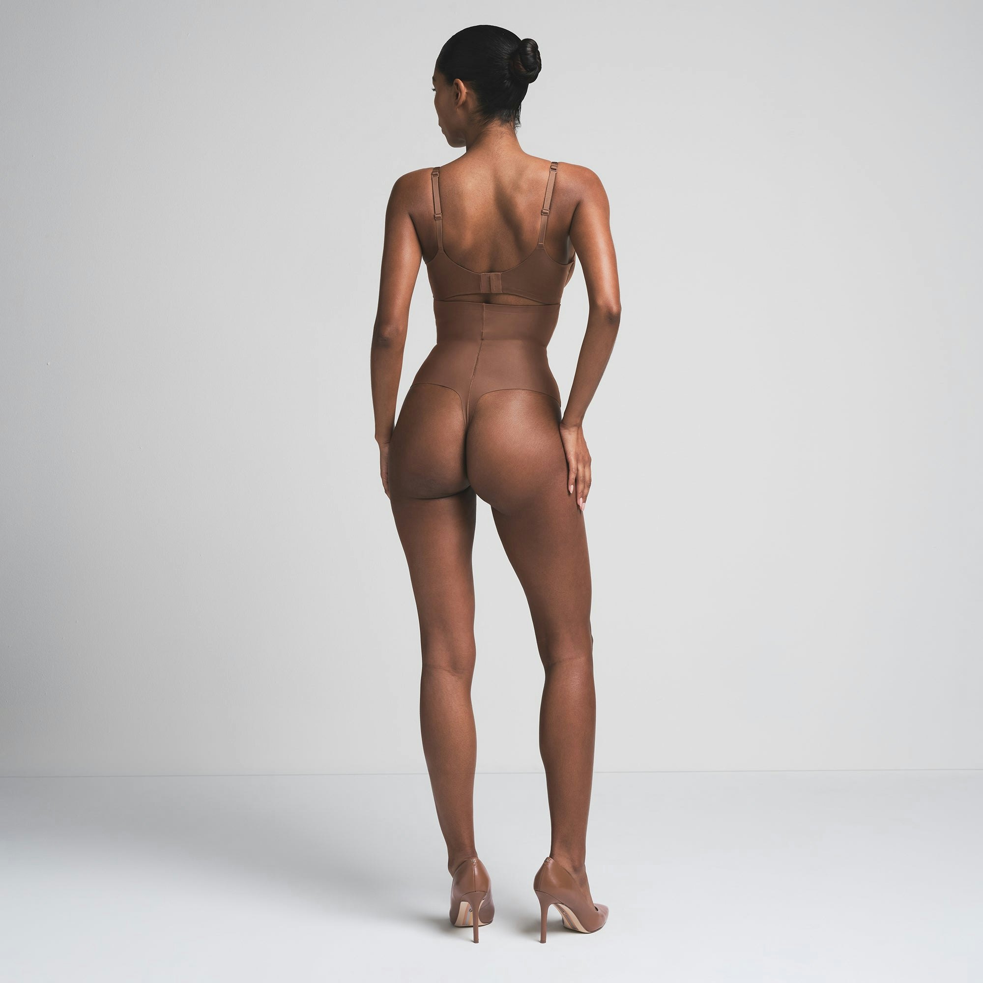 SKIMS BODY CORE SCULPT HIGH-WAISTED THONG | JASPER  ON A MODEL BACK VIEW | FOCUS: 0.0, 1.0, 0.9