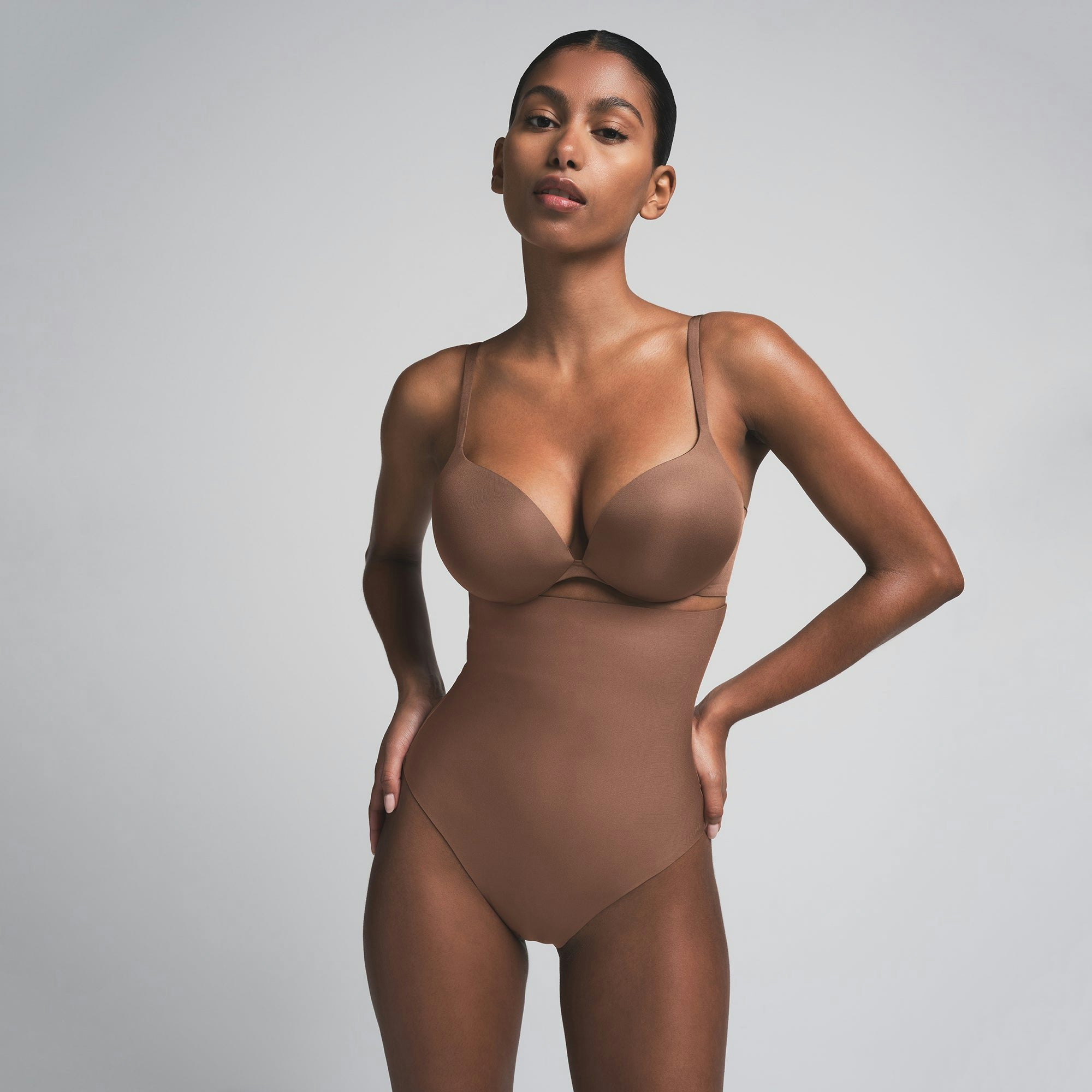 SKIMS BODY CORE SCULPT HIGH-WAISTED THONG | JASPER  ON A MODEL FRONT VIEW | FOCUS: 0.0, 1.0, 0.9