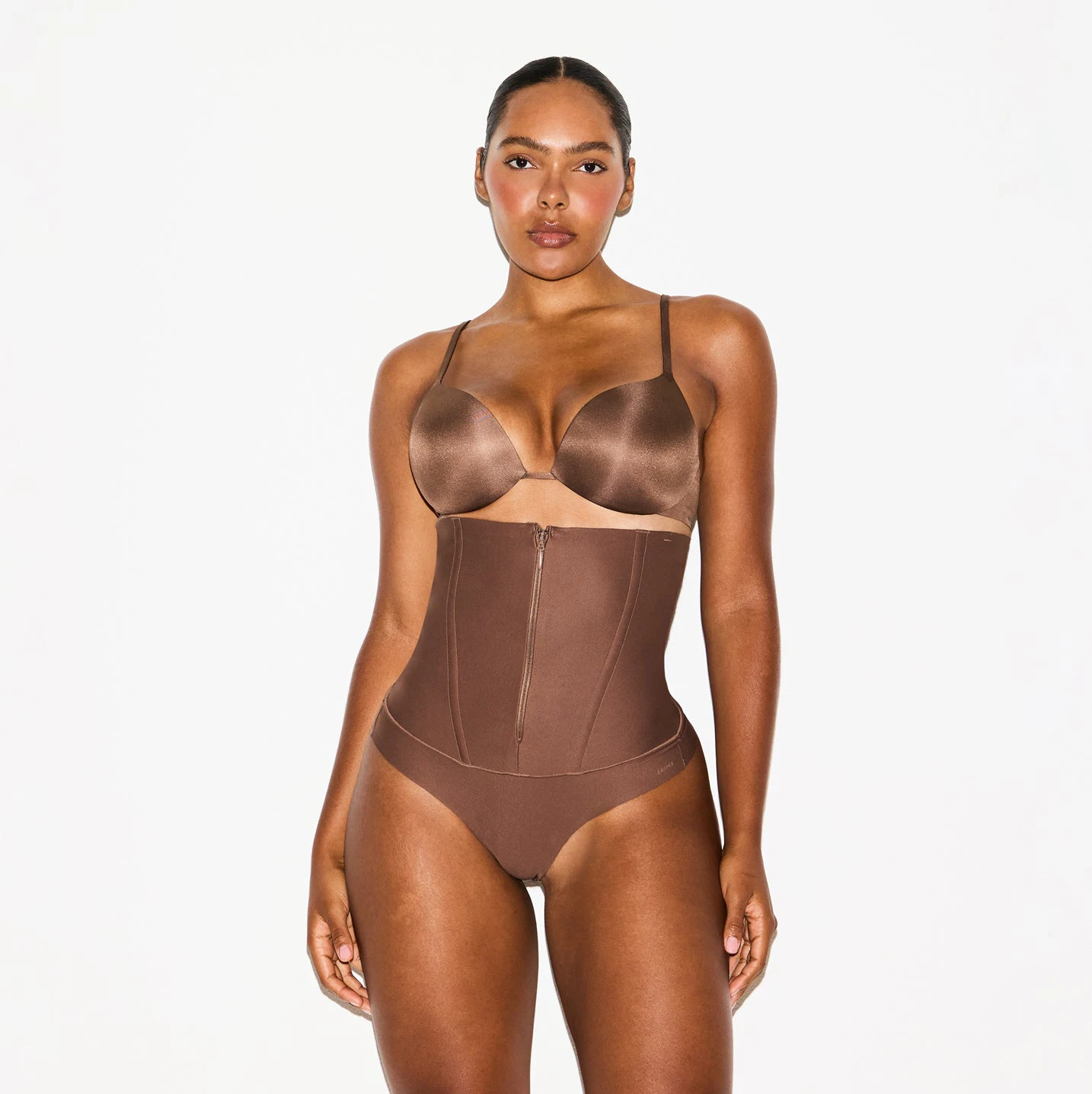 SKIMS BODY CORE SCULPT WAIST CINCHER THONG | JASPER ON A MODEL SIDE VIEW @ | FOCUS: 0.0, 1.0, 0.9