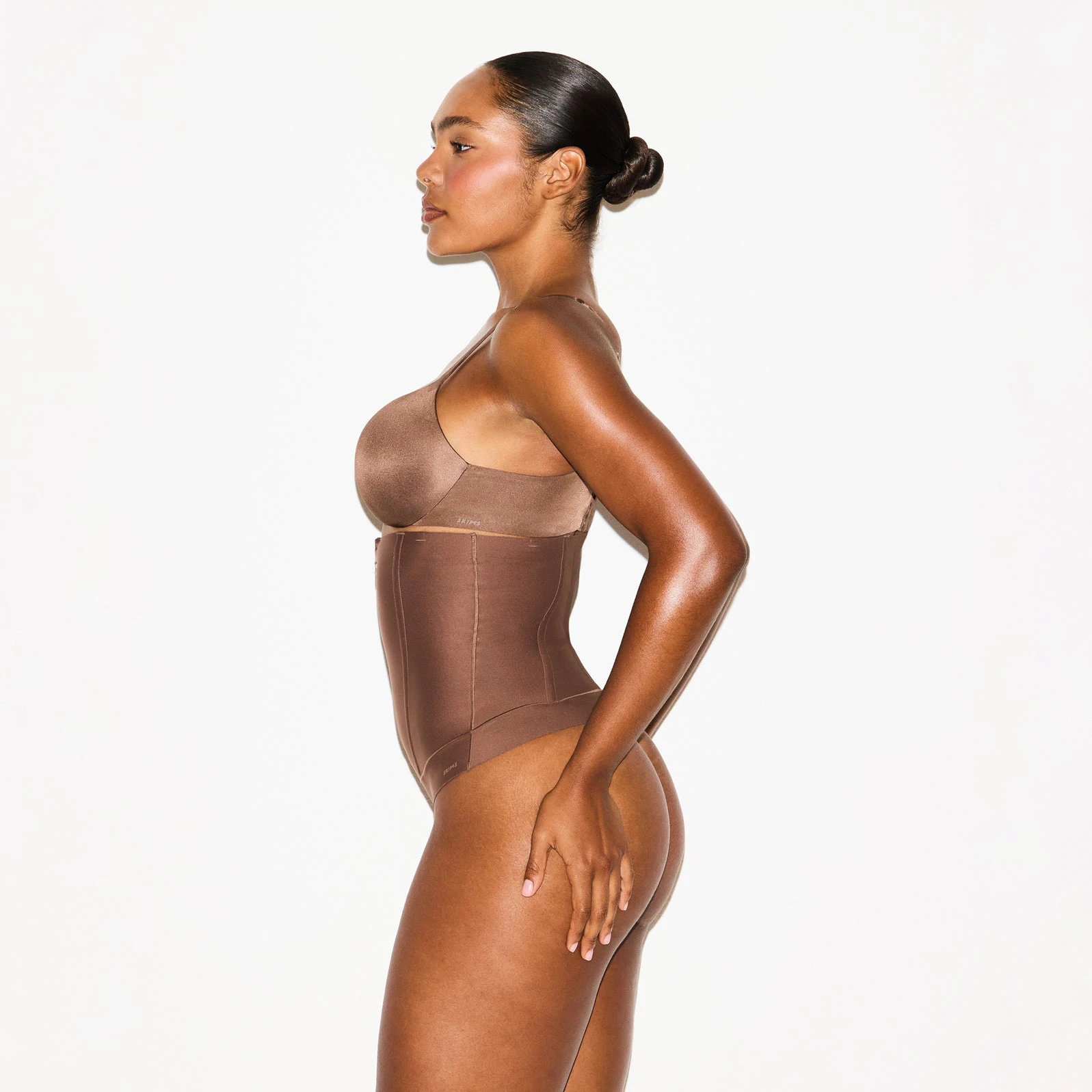 SKIMS BODY CORE SCULPT WAIST CINCHER THONG | JASPER ON A MODEL SIDE VIEW @ | FOCUS: 0.0, 1.0, 0.9