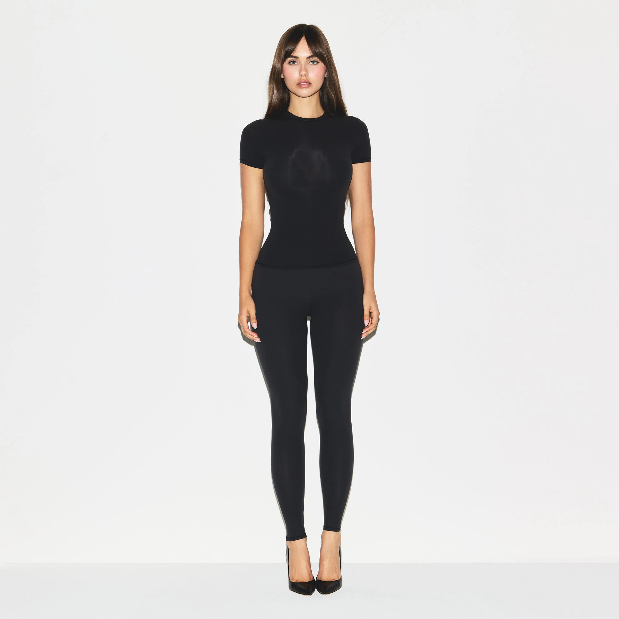 SKIMS BODY CORE SCULPT WAIST CINCHER THONG | ONYX ON A MODEL FRONT VIEW @ | FOCUS: 0.0, 1.0, 0.9