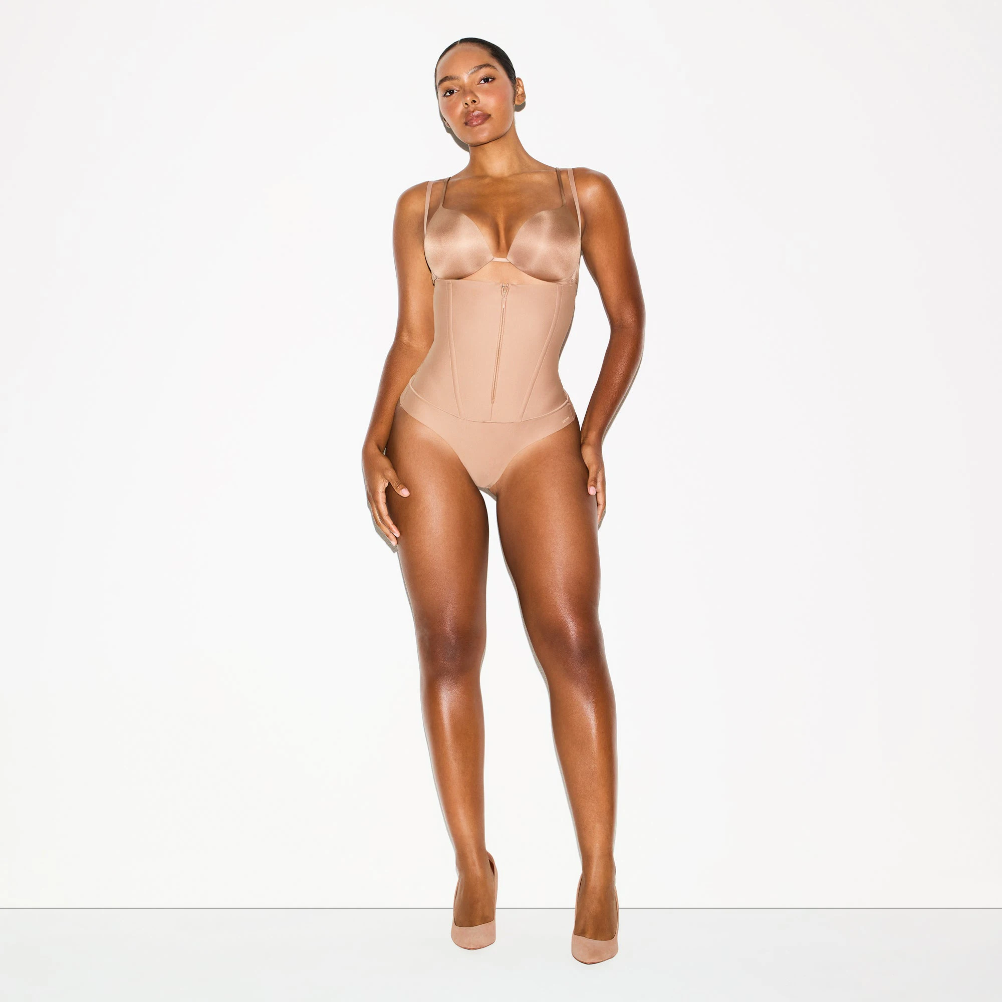 SKIMS BODY CORE SCULPT WAIST CINCHER THONG | SIENNA ON A MODEL FRONT VIEW @ | FOCUS: 0.0, 1.0, 0.9