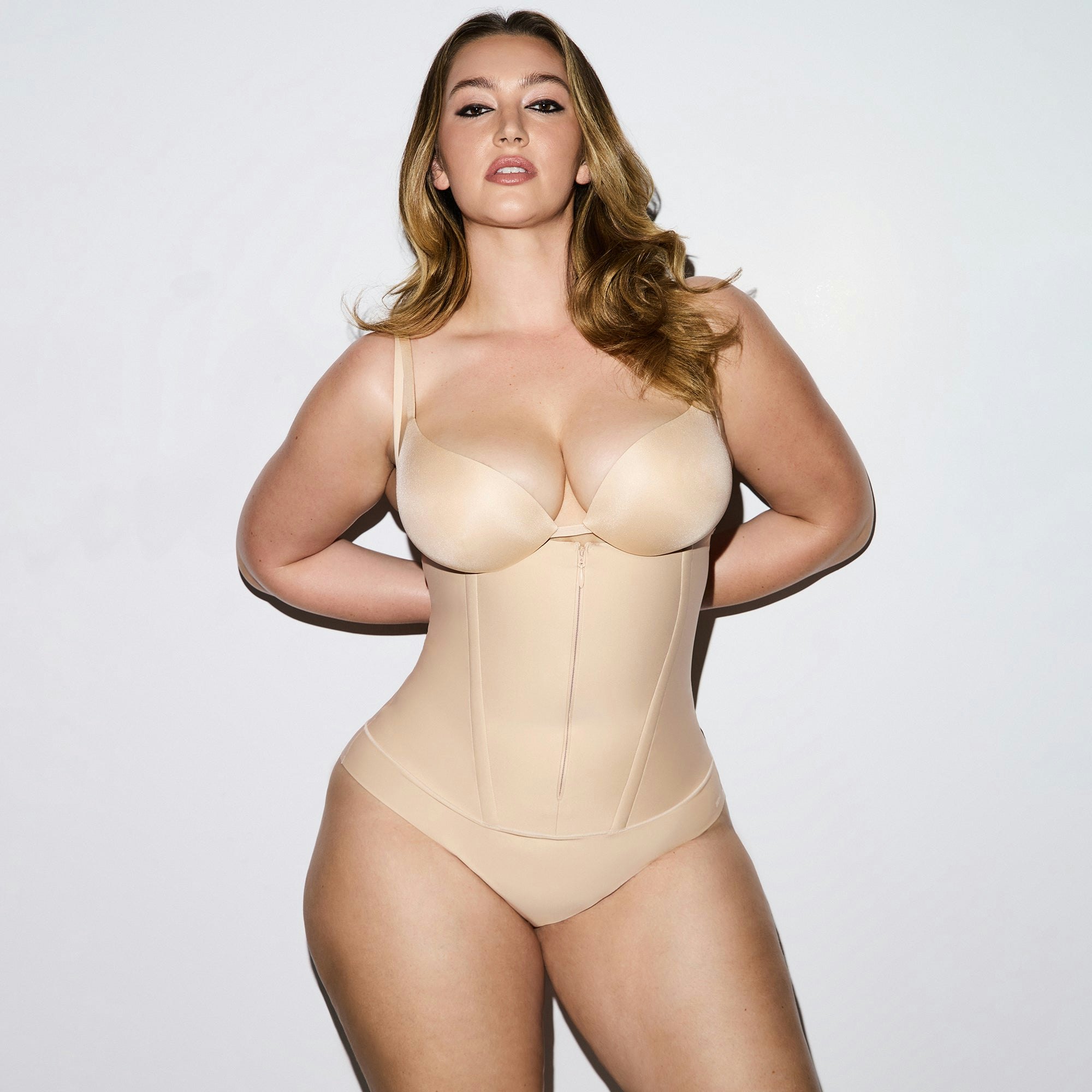 SKIMS BODY CORE SCULPT WAIST CINCHER THONG | SAND CAMPAIGN IMAGERY @ | FOCUS: 0.0, 1.0, 0.9