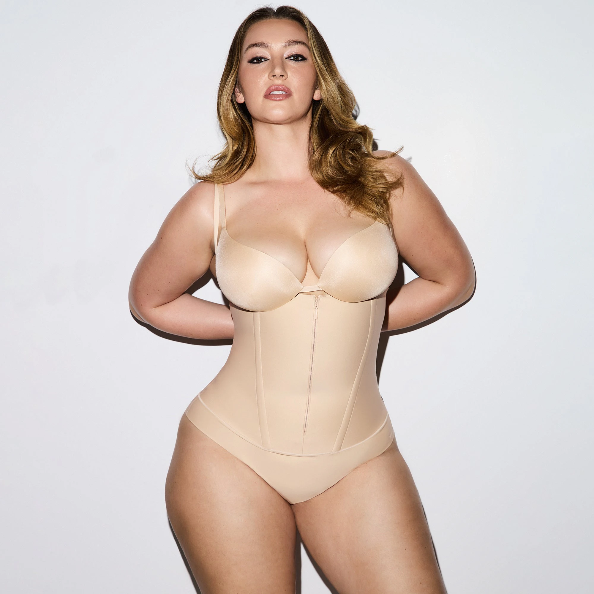 SKIMS BODY CORE SCULPT WAIST CINCHER THONG | SAND CAMPAIGN IMAGERY @ | FOCUS: 0.0, 1.0, 0.9