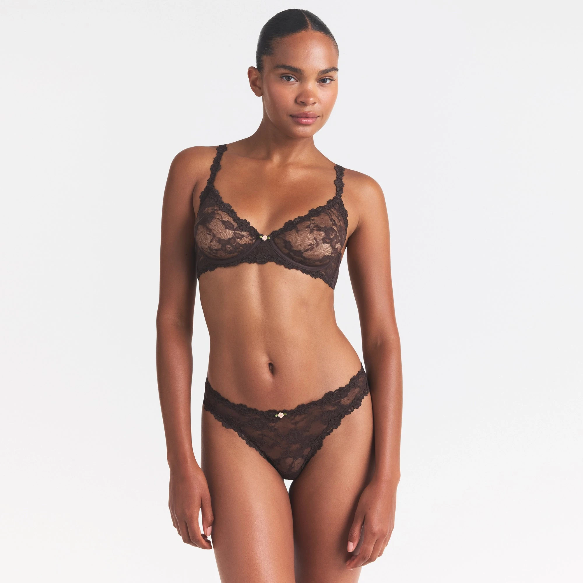 STRETCH LACE DIPPED THONG | ESPRESSO ON A MODEL SIDE VIEW @ | FOCUS: 0.0, 1.0, 0.9