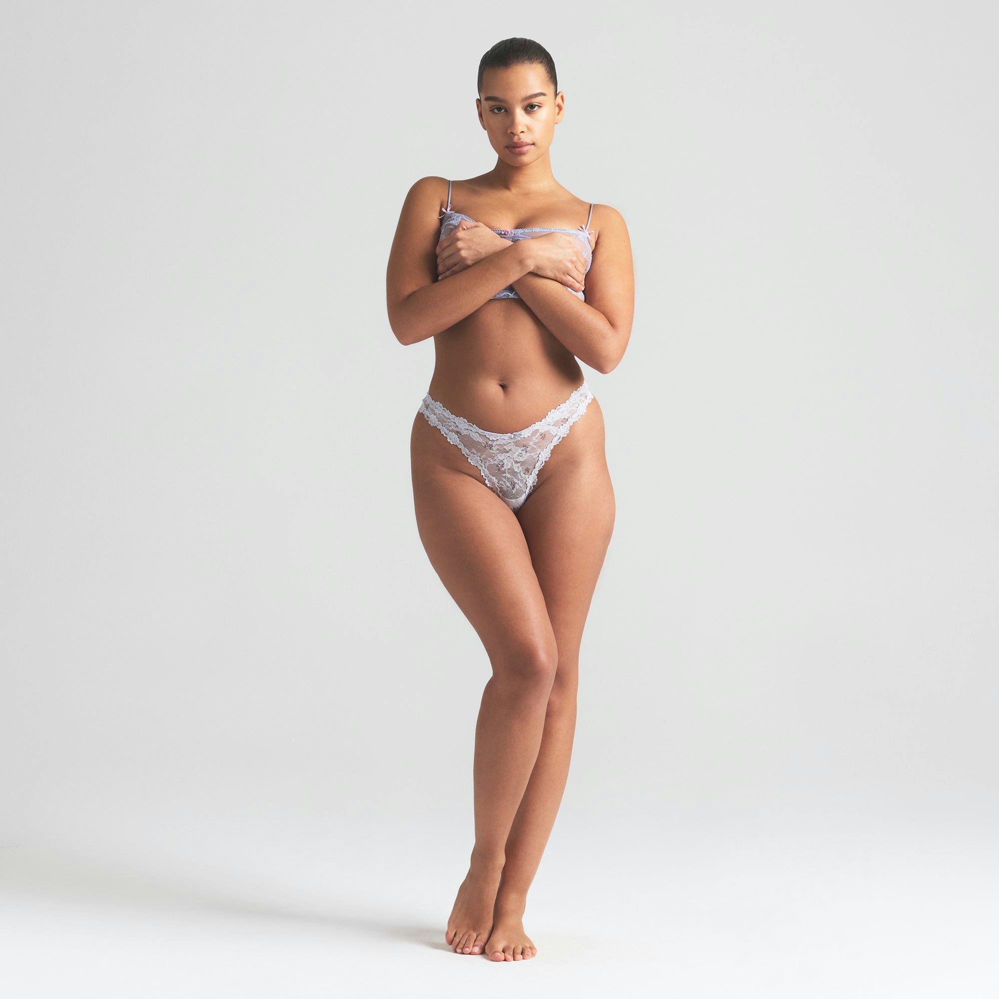 STRETCH LACE DIPPED THONG | WIND ROSEBUD PRINT ON A MODEL FRONT VIEW | FOCUS: 0.0, 1.0, 0.9