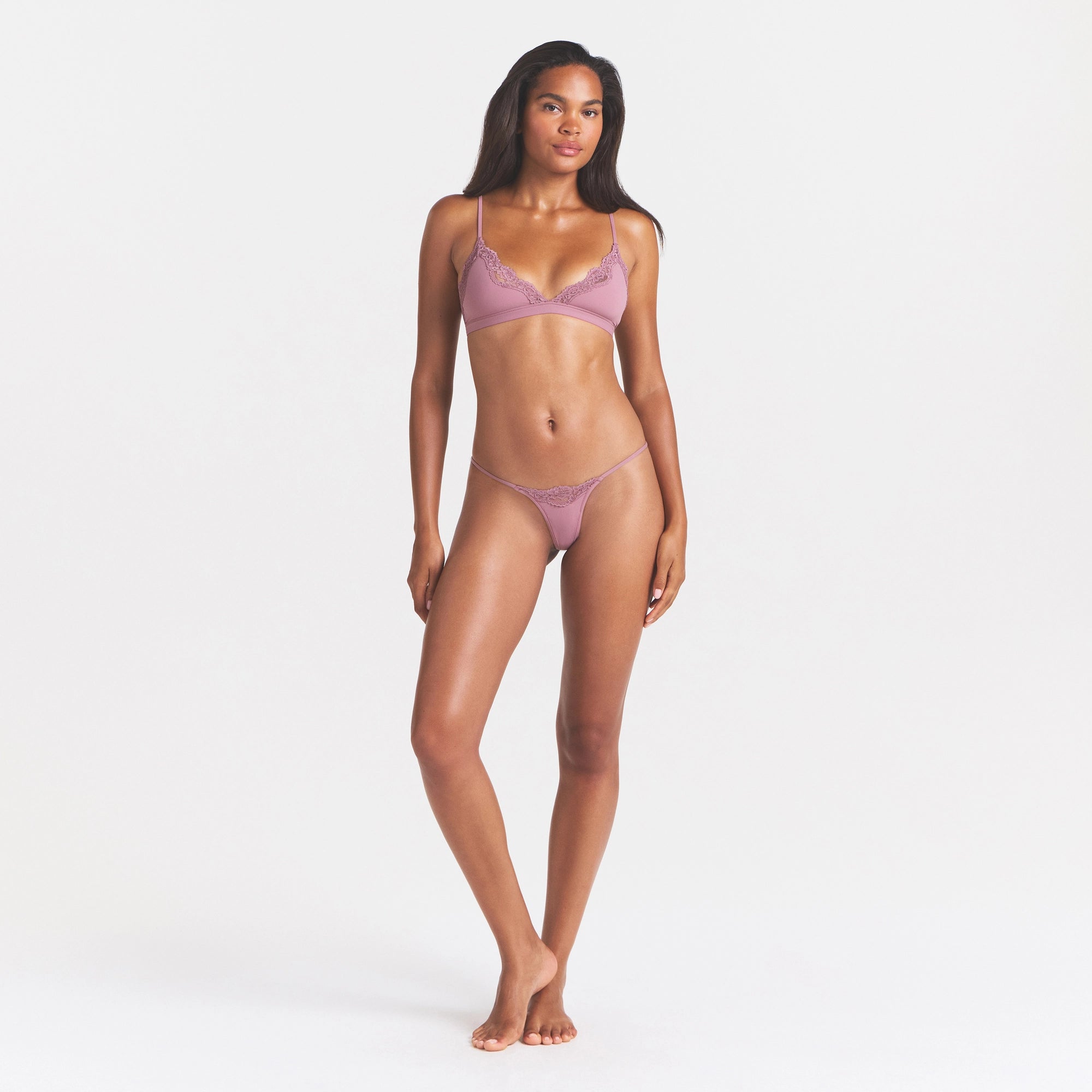 FITS EVERYBODY LACE STRING THONG | MUTED MAUVE ON A MODEL FRONT VIEW @ | FOCUS: 0.0, 1.0, 0.9
