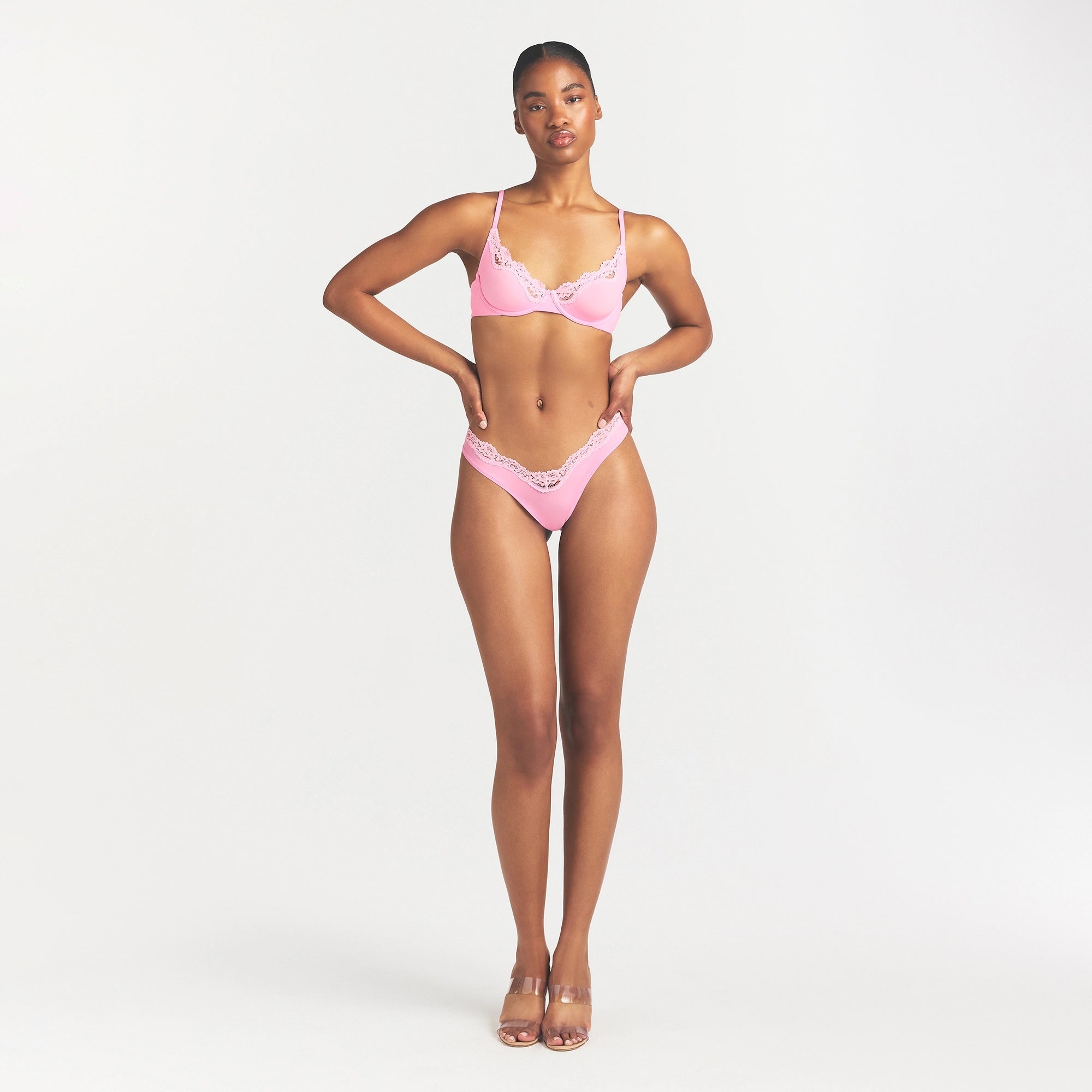 FITS EVERYBODY LACE DIPPED THONG | BUBBLE GUM TONAL ON A MODEL FRONT VIEW