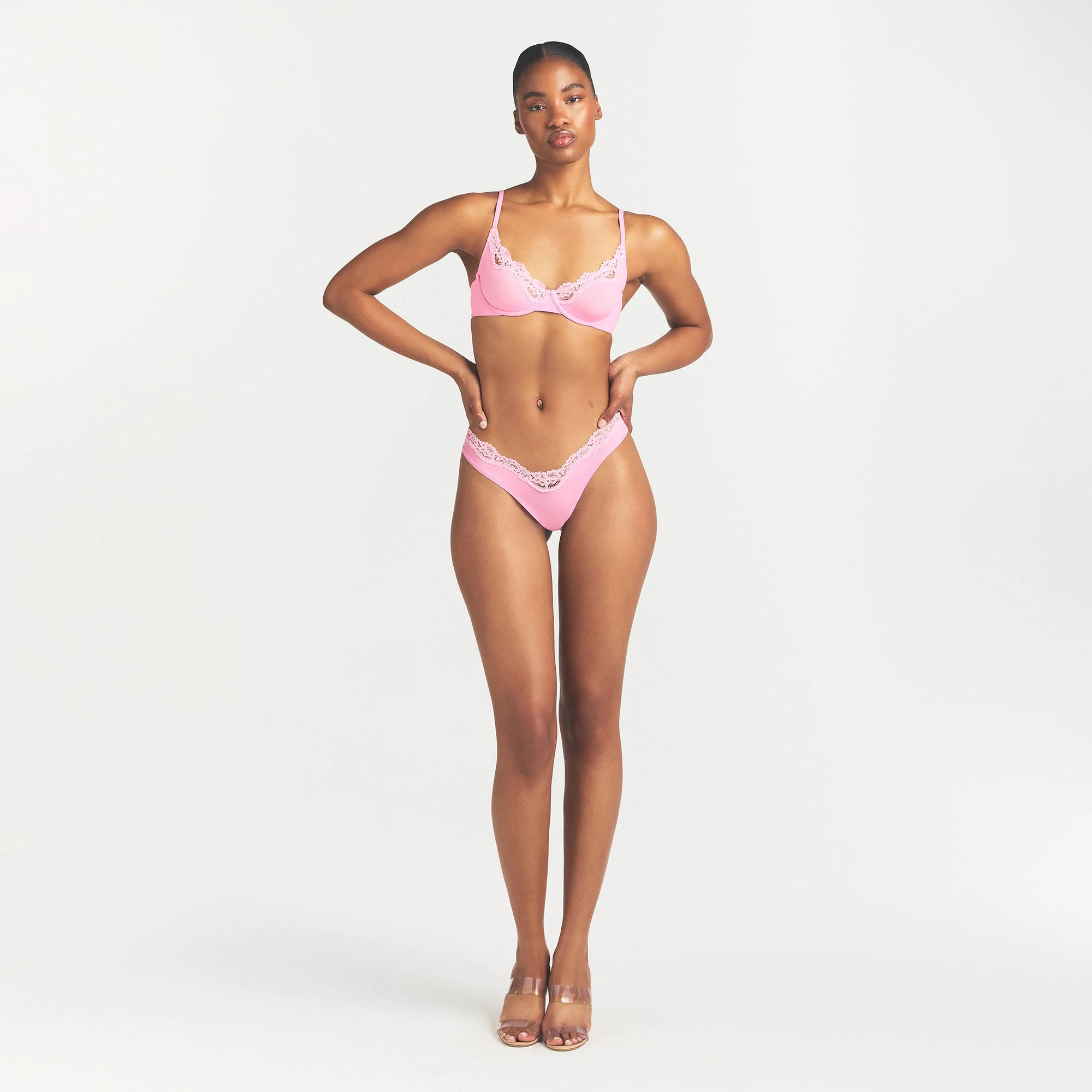 FITS EVERYBODY LACE DIPPED THONG | BUBBLE GUM TONAL ON A MODEL FRONT VIEW @ | FOCUS: 0.0, 1.0, 0.9
