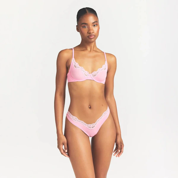 FITS EVERYBODY LACE DIPPED THONG | BUBBLE GUM TONAL ON A MODEL FRONT VIEW