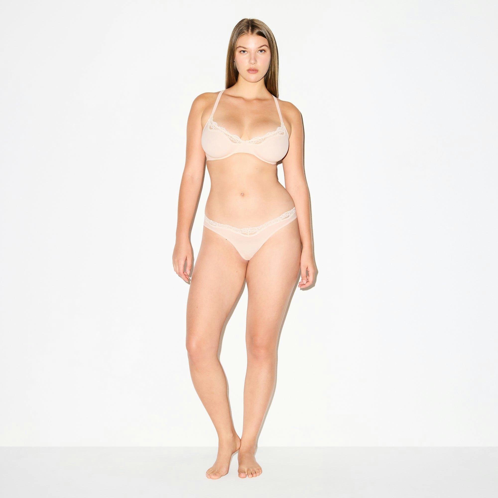 FITS EVERYBODY LACE DIPPED THONG | PRIMROSE ON A MODEL FRONT VIEW @ | FOCUS: 0.0, 1.0, 0.9