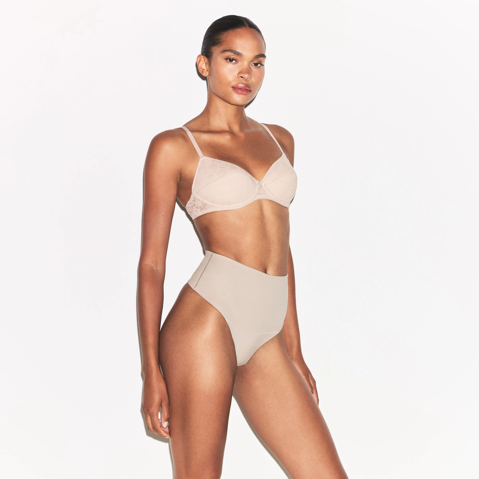 COTTON SHAPEWEAR HIGH-WAISTED THONG | LINEN ON A MODEL SIDE VIEW | FOCUS: 0.0, 1.0, 0.9