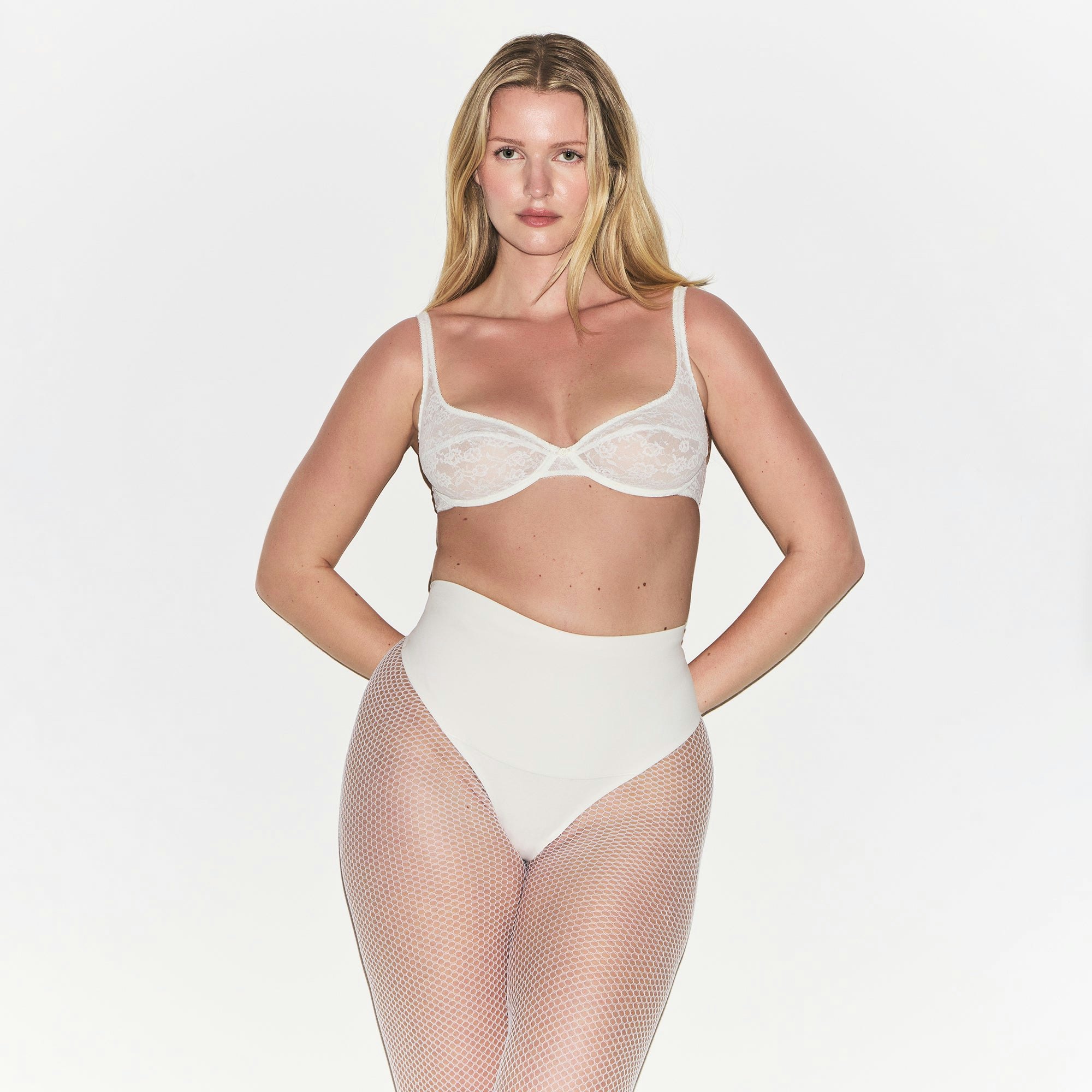 COTTON SHAPEWEAR HIGH-WAISTED THONG | MARBLE ON A MODEL FRONT VIEW | FOCUS: 0.0, 1.0, 0.9