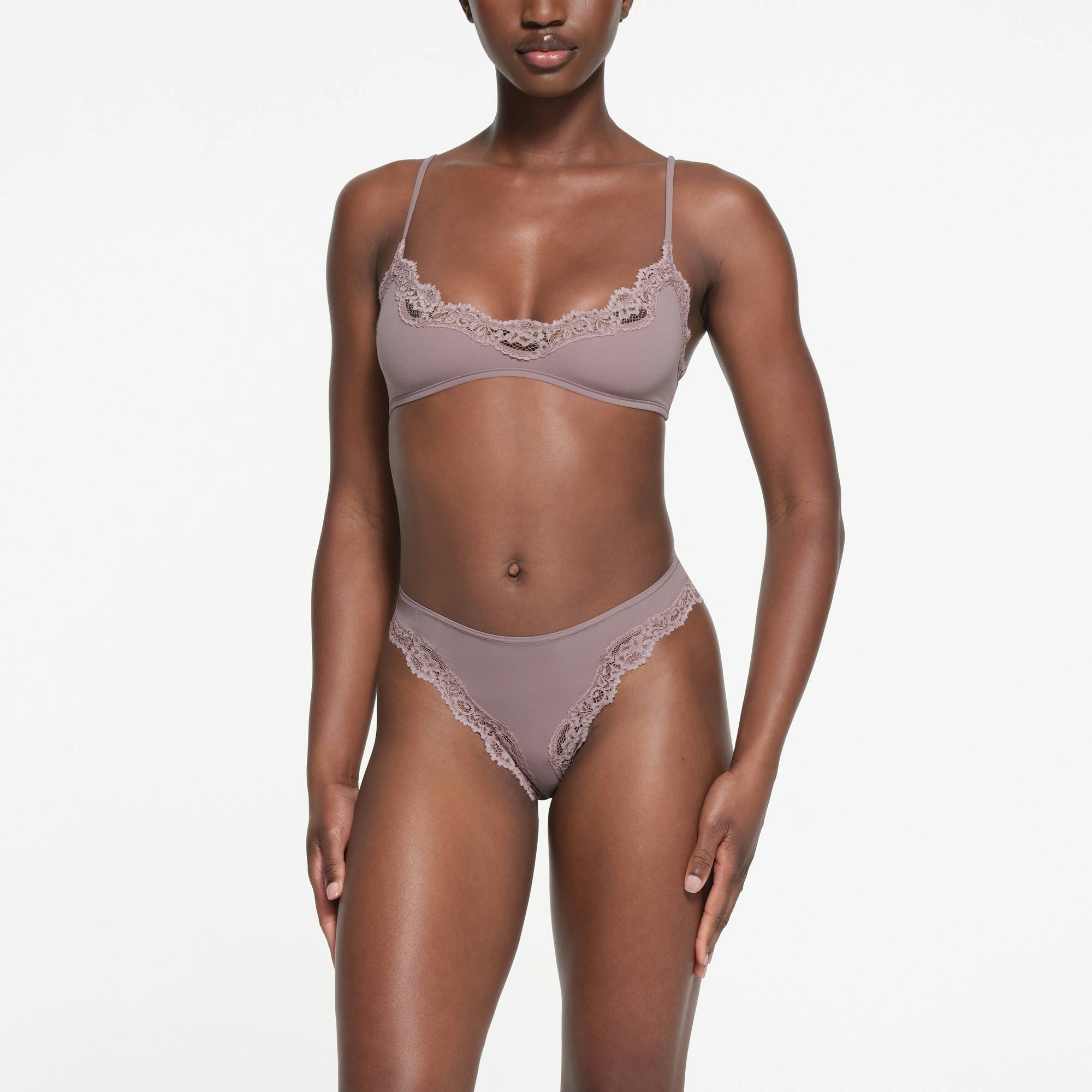 FITS EVERYBODY LACE TANGA | ZINC ON A MODEL FRONT VIEW
