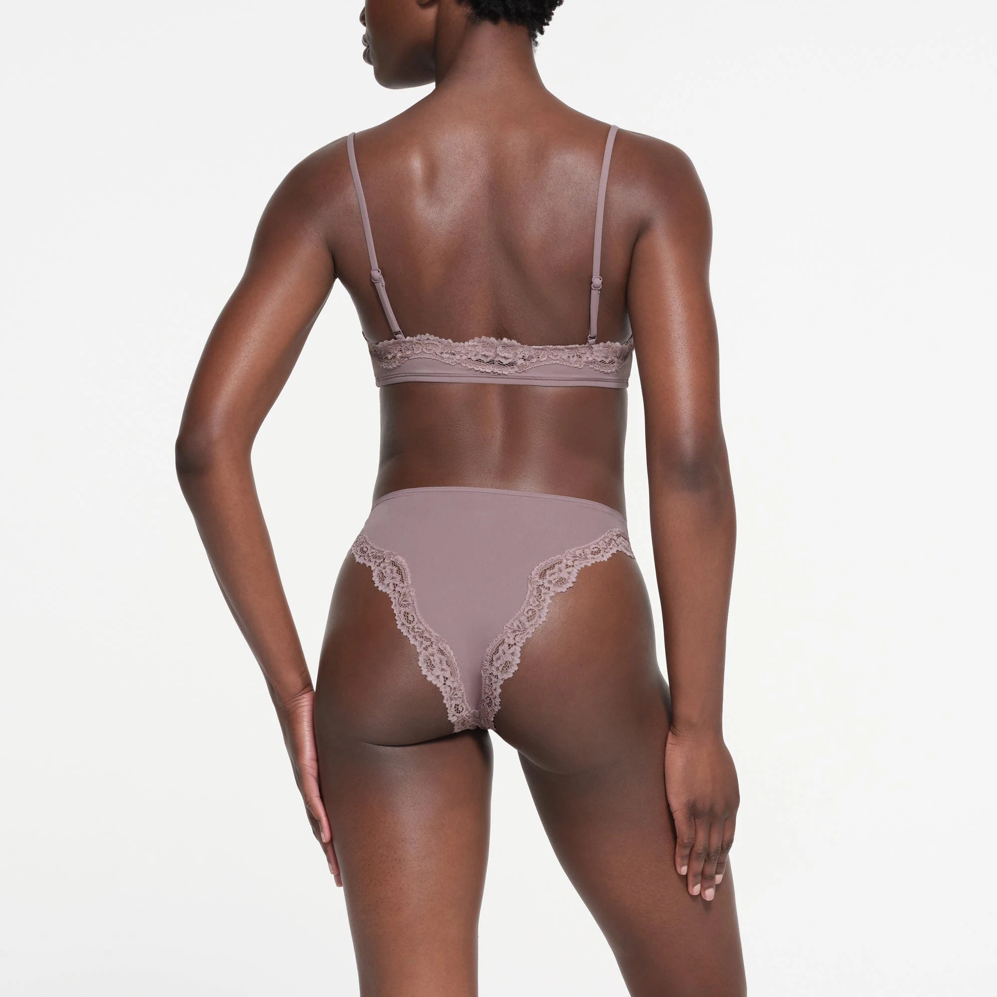 FITS EVERYBODY LACE TANGA | ZINC ON A MODEL BACK VIEW