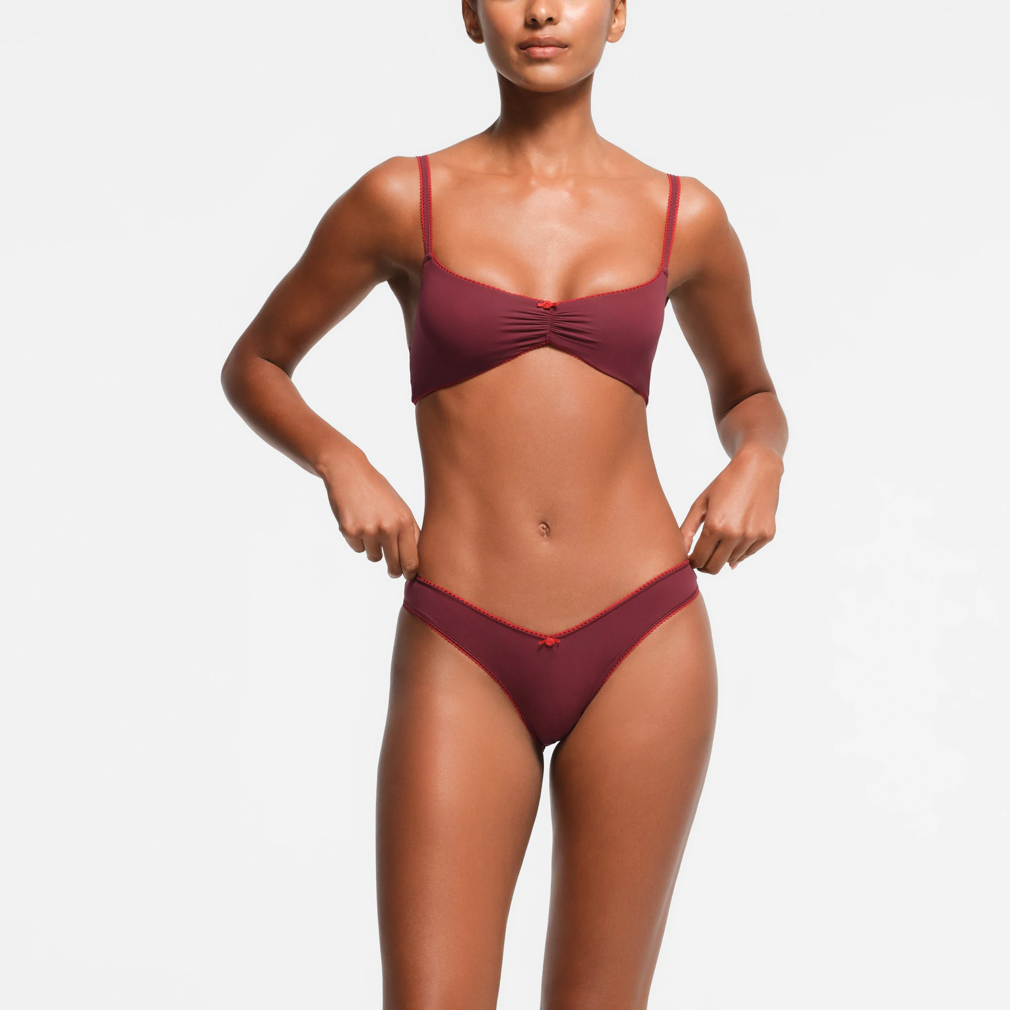 FITS EVERYBODY PICOT TRIM TANGA | WINE ON A MODEL FRONT VIEW