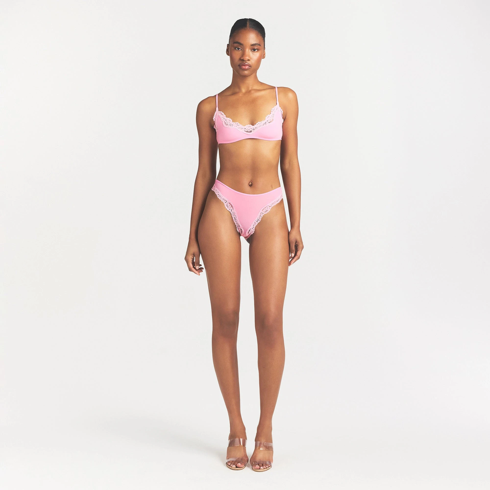 FITS EVERYBODY LACE TANGA | BUBBLE GUM TONAL ON A MODEL FRONT VIEW