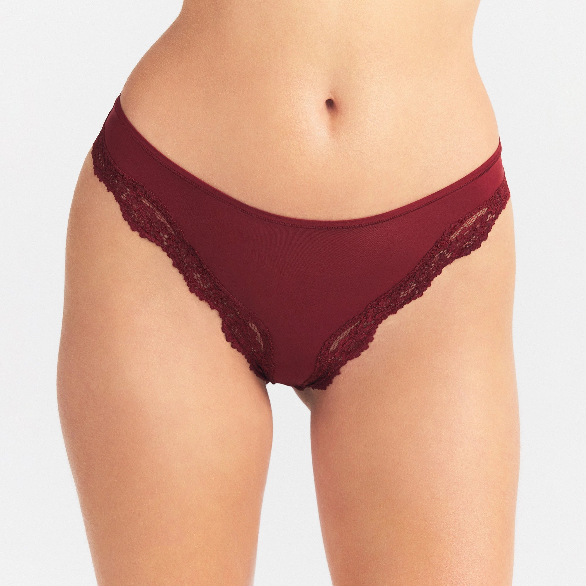 FITS EVERYBODY LACE TANGA | MERLOT ON A MODEL SIDE VIEW