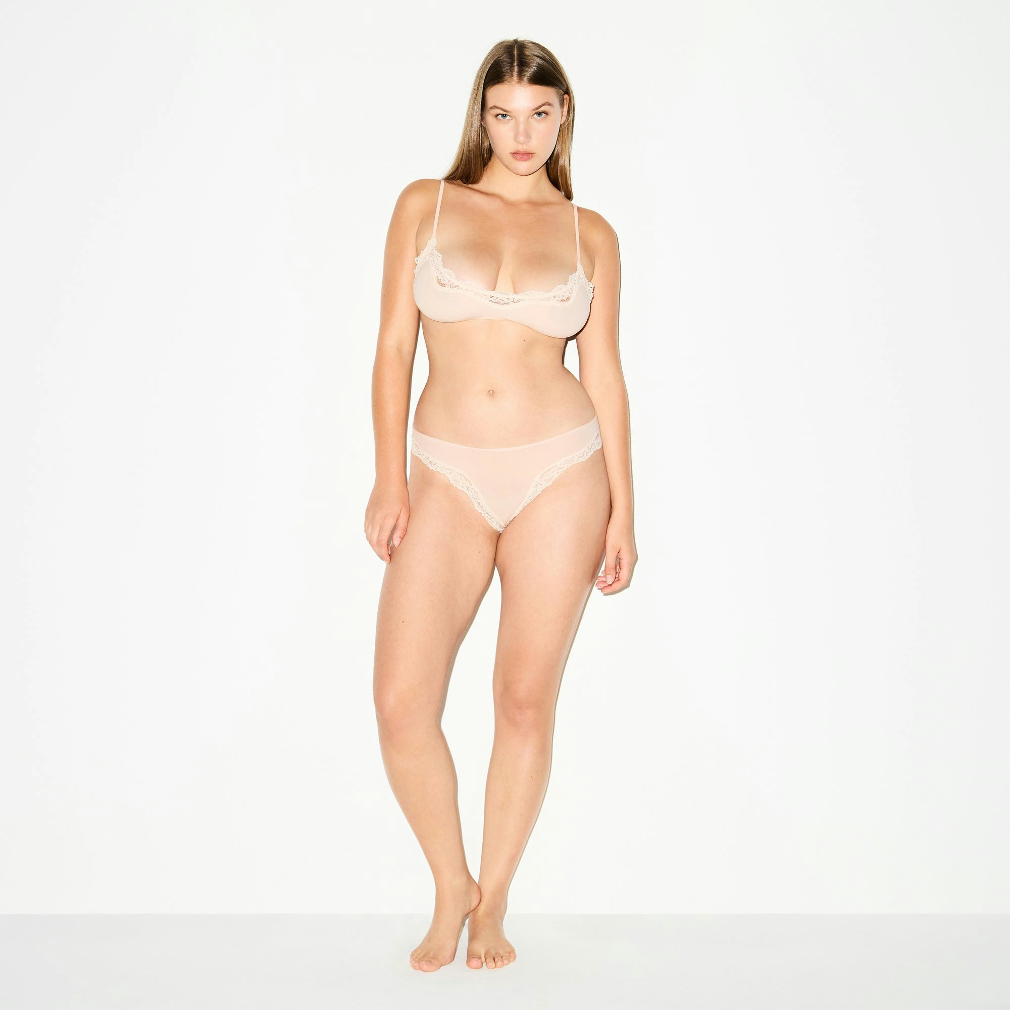 FITS EVERYBODY LACE TANGA | PRIMROSE ON A MODEL FRONT VIEW @ | FOCUS: 0.0, 1.0, 0.9