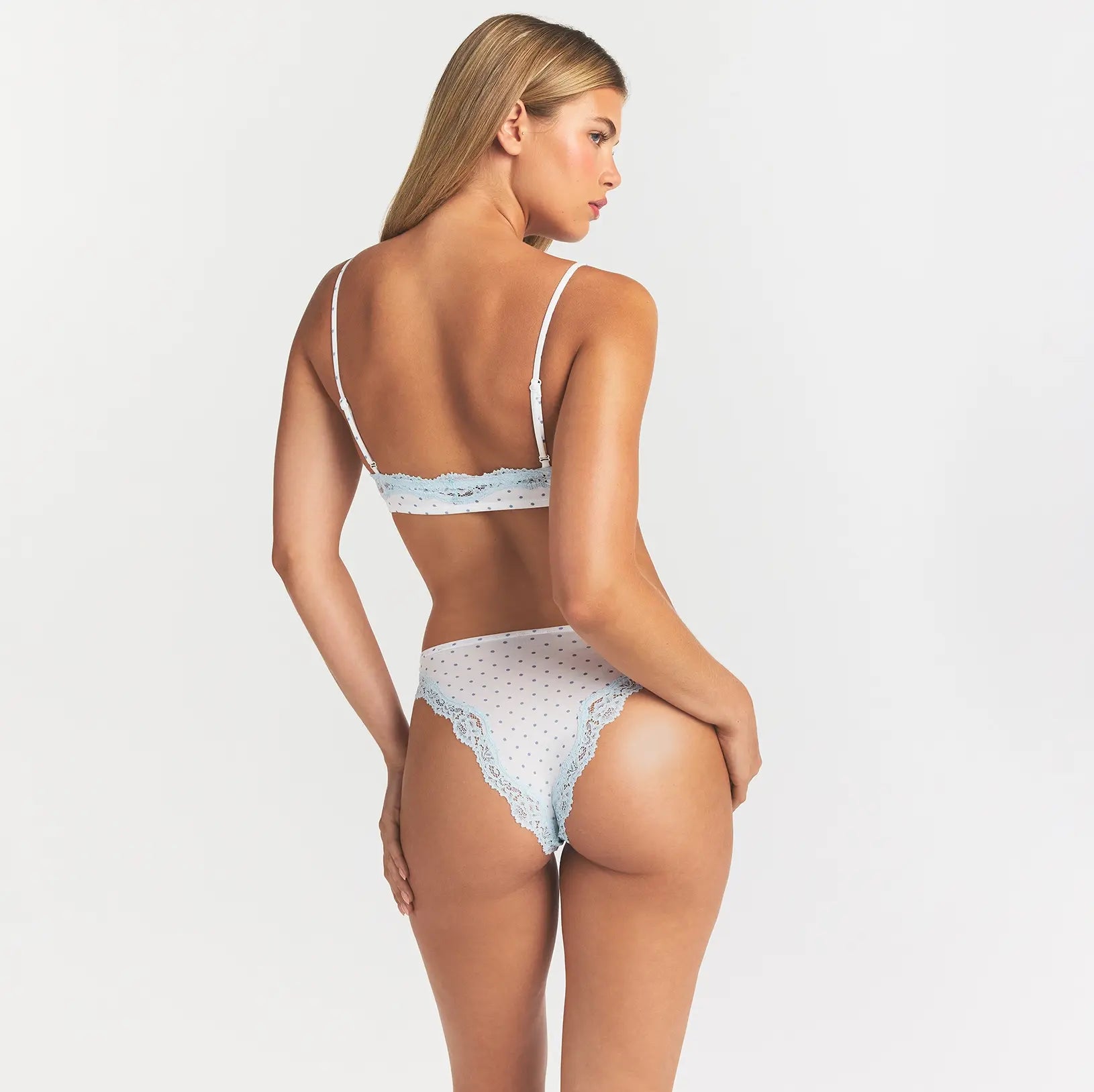 FITS EVERYBODY LACE TANGA | SLATE PIN DOT PRINT ON A MODEL BACK VIEW @ | FOCUS: 0.0, 1.0, 0.9