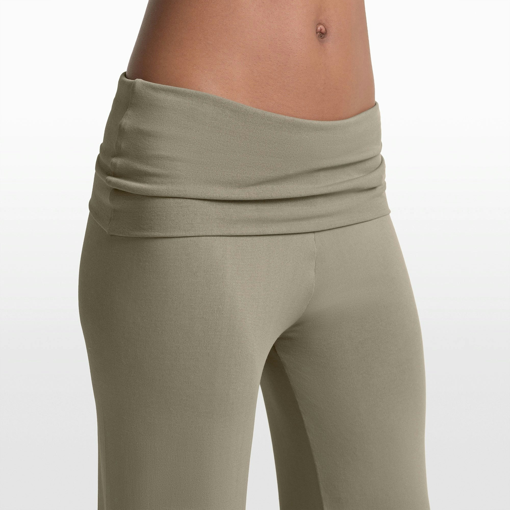 NikeSKIMS STRETCH KNIT FOLDOVER WIDE LEG PANT | DUNE ON A MODEL FRONT VIEW @ | FOCUS: 0.0, 1.0, 0.9