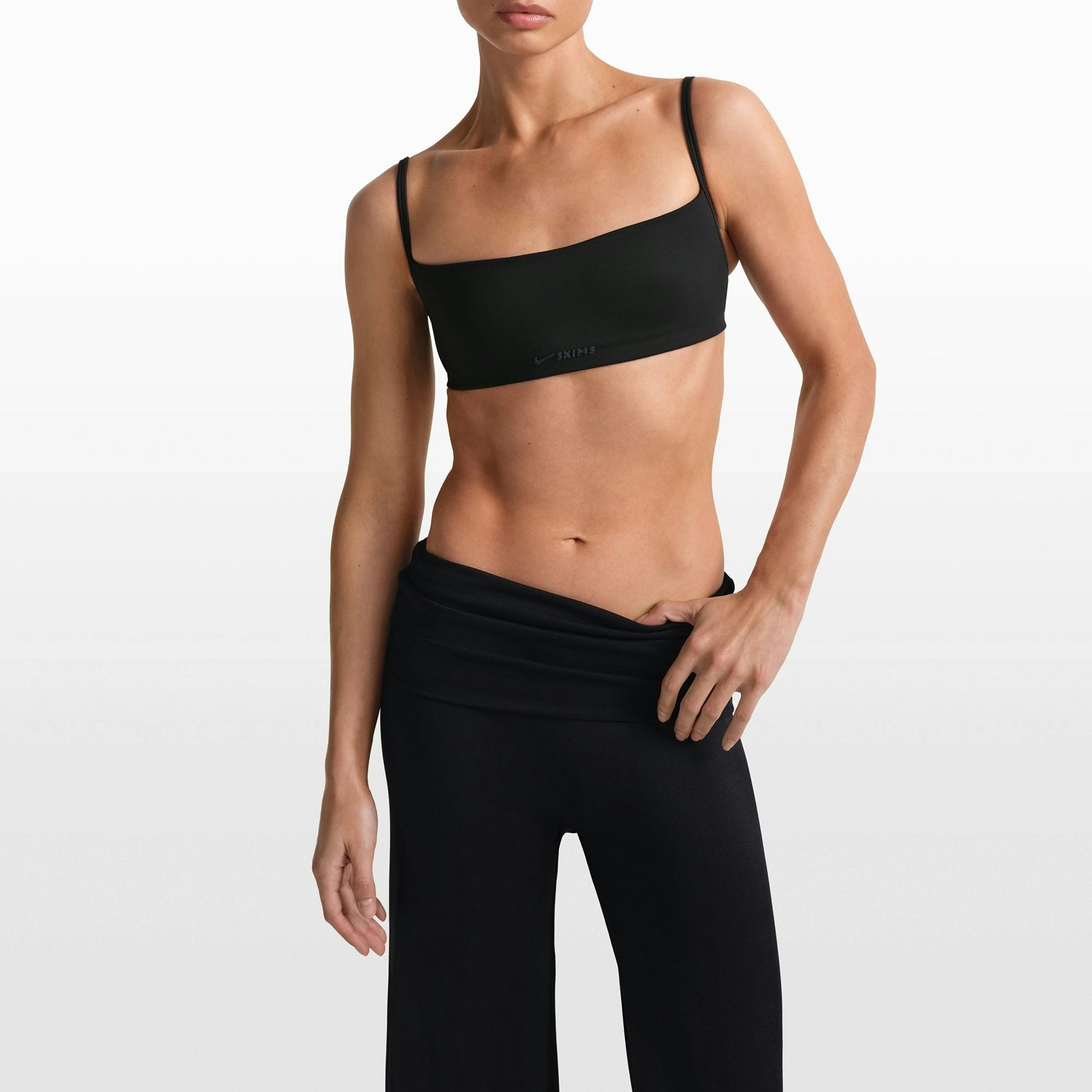 NikeSKIMS STRETCH KNIT FOLDOVER WIDE LEG PANT | OBSIDIAN ON A MODEL FRONT VIEW @ | FOCUS: 0.0, 1.0, 0.9