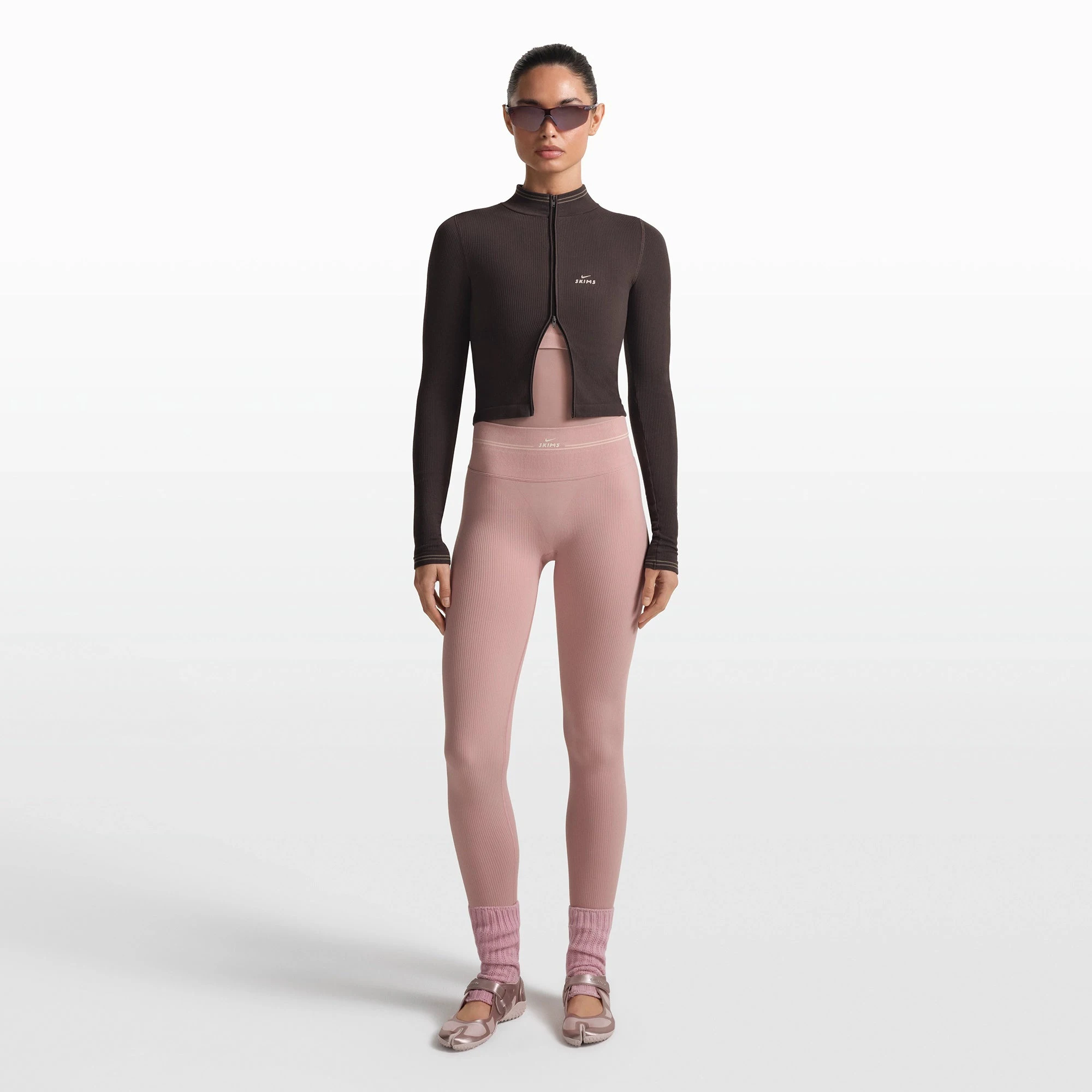 NikeSKIMS RIBBED SEAMLESS 26" LEGGING | HIMALAYAN/ECRU ON A MODEL FRONT VIEW @ | FOCUS: 0.0, 1.0, 0.9