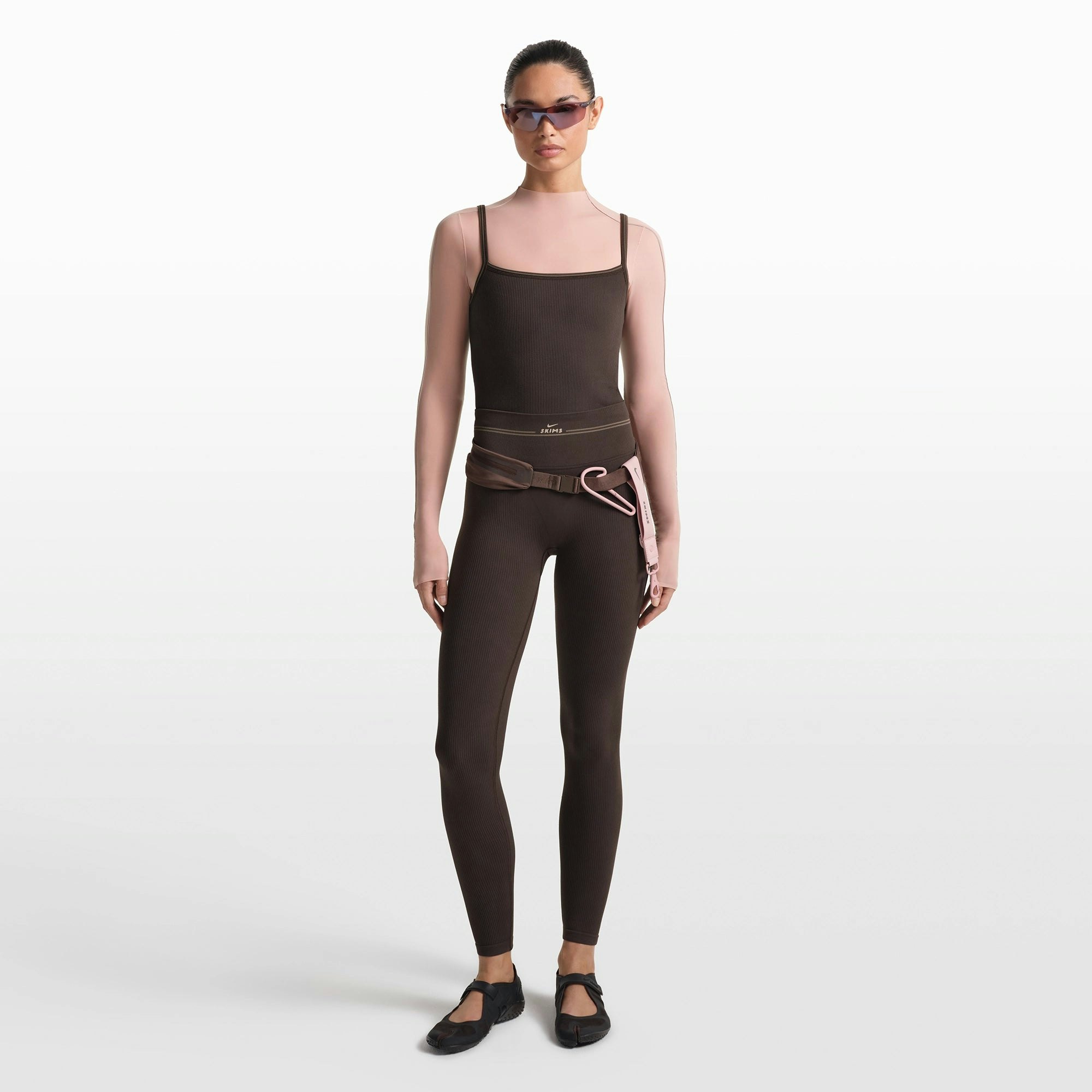 NikeSKIMS RIBBED SEAMLESS 26" LEGGING | PHOENIX/TRUFFLE ON A MODEL FRONT VIEW @ | FOCUS: 0.0, 1.0, 0.9