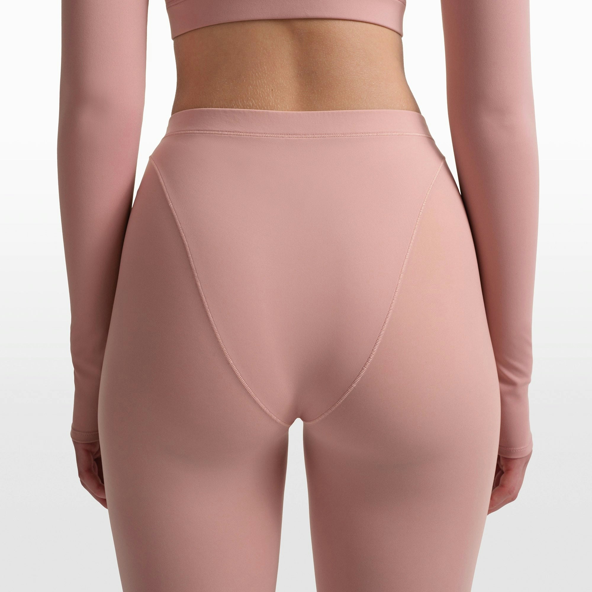 NikeSKIMS WEIGHTLESS LAYERS V-LINE 26" LEGGING | HIMALAYAN ON A MODEL FRONT VIEW @ | FOCUS: 0.0, 1.0, 0.9