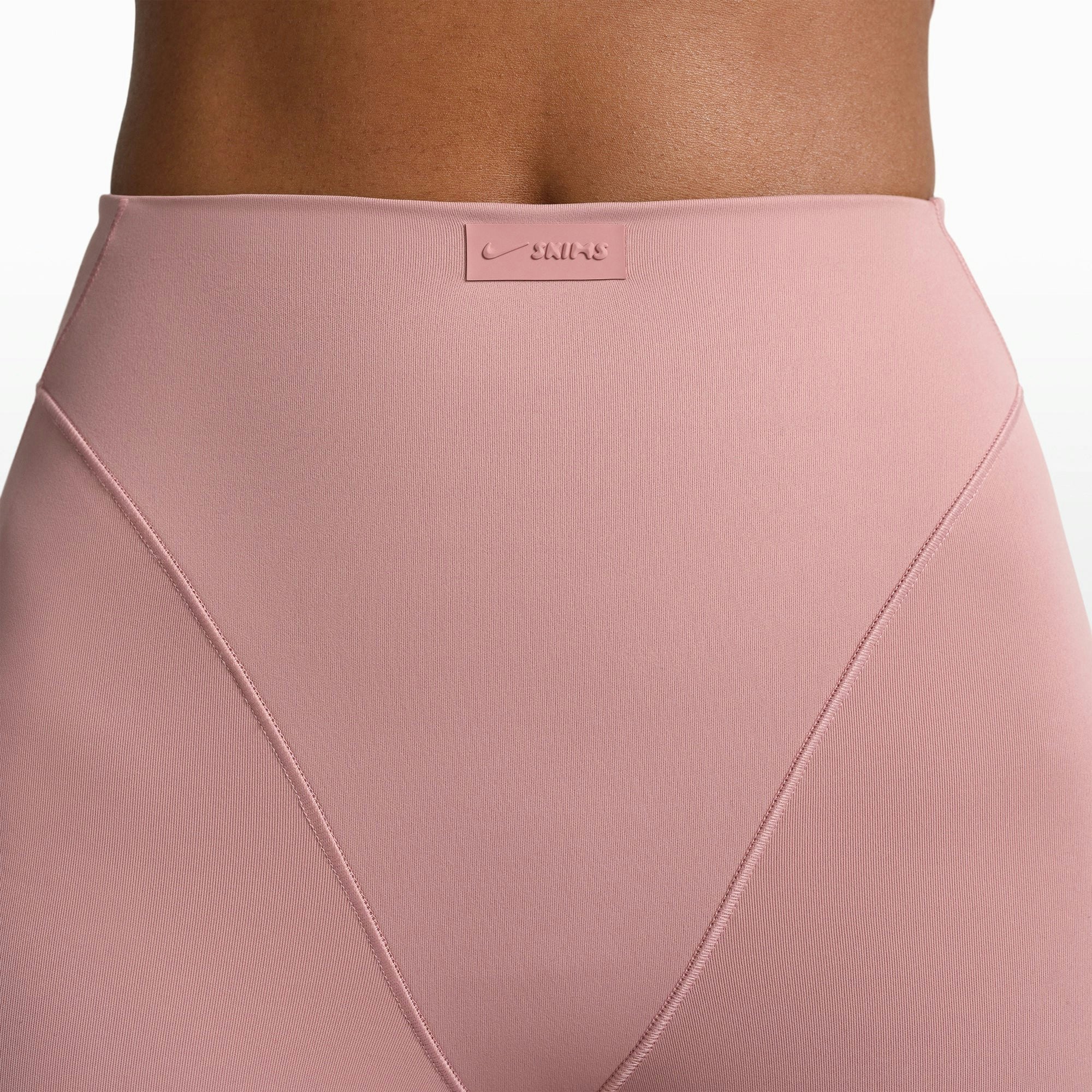 NikeSKIMS MATTE 17" V-LINE CROP LEGGING | HIMALAYAN ON A MODEL FRONT VIEW @ | FOCUS: 0.0, 1.0, 0.9