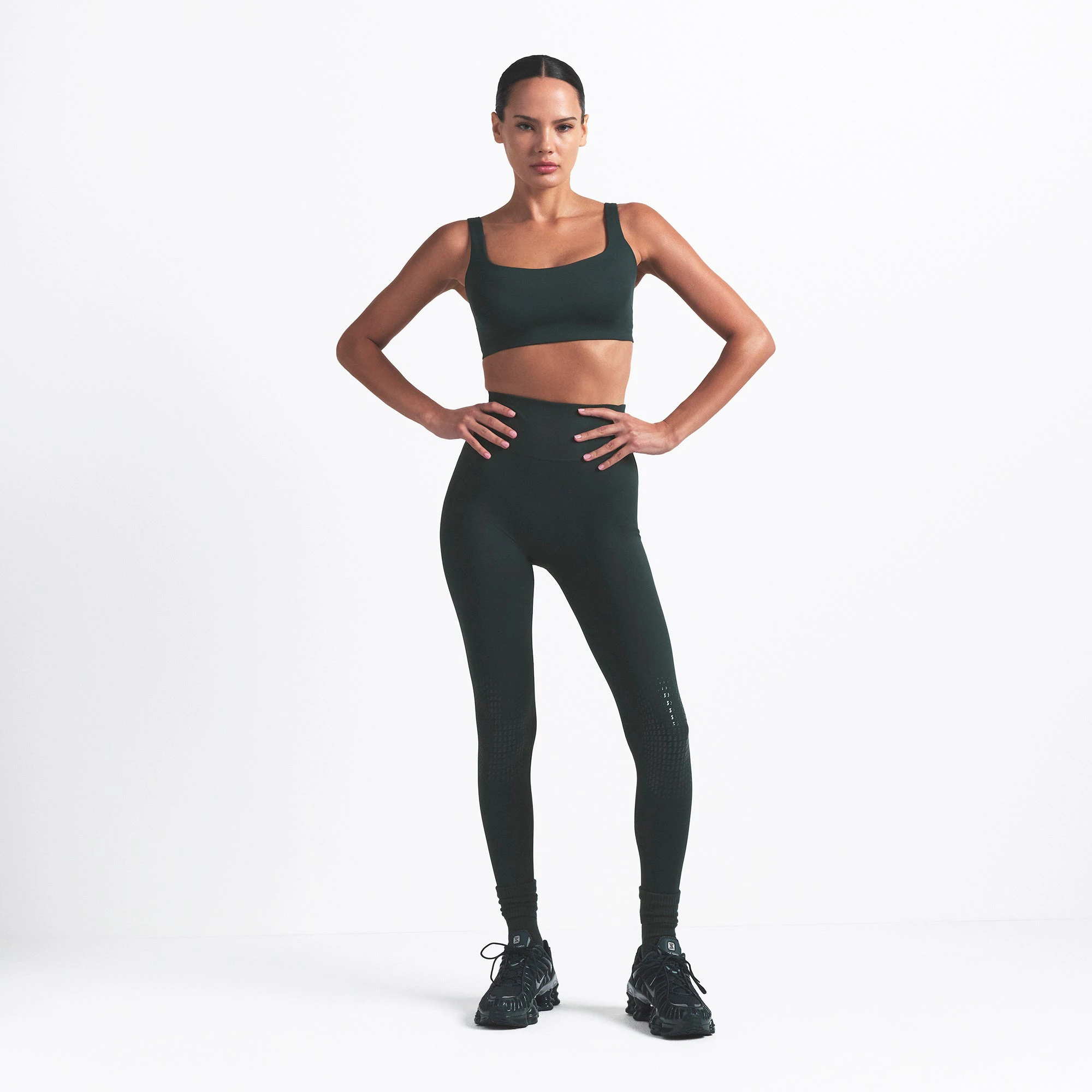 NikeSKIMS MATTE KNEE GRIP 26" LEGGING | DARK TEAL ON A MODEL FRONT VIEW @ | FOCUS: 0.0, 1.0, 0.9