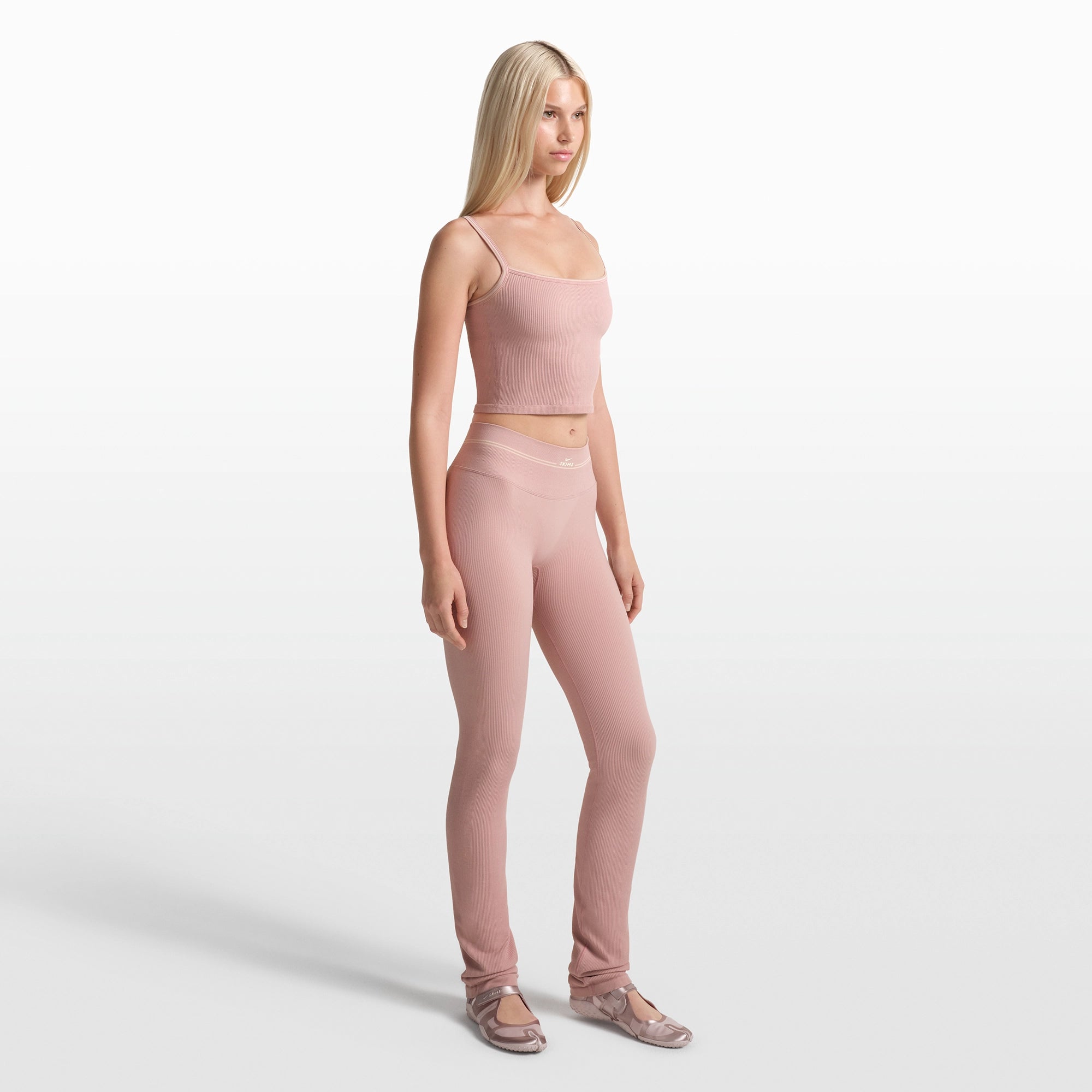 NikeSKIMS RIBBED SEAMLESS 34" STRAIGHT LEGGING | HIMALAYAN/ECRU ON A MODEL FRONT VIEW @ | FOCUS: 0.0, 1.0, 0.9