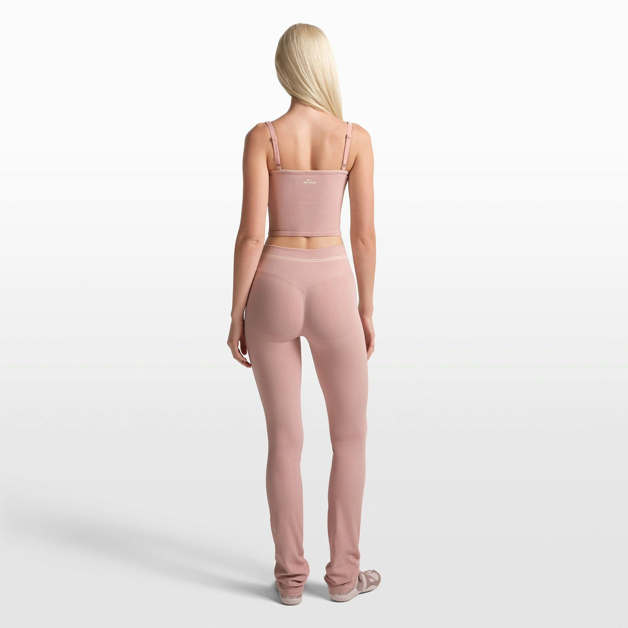 NikeSKIMS RIBBED SEAMLESS 34" STRAIGHT LEGGING | HIMALAYAN/ECRU ON A MODEL FRONT VIEW @ | FOCUS: 0.0, 1.0, 0.9