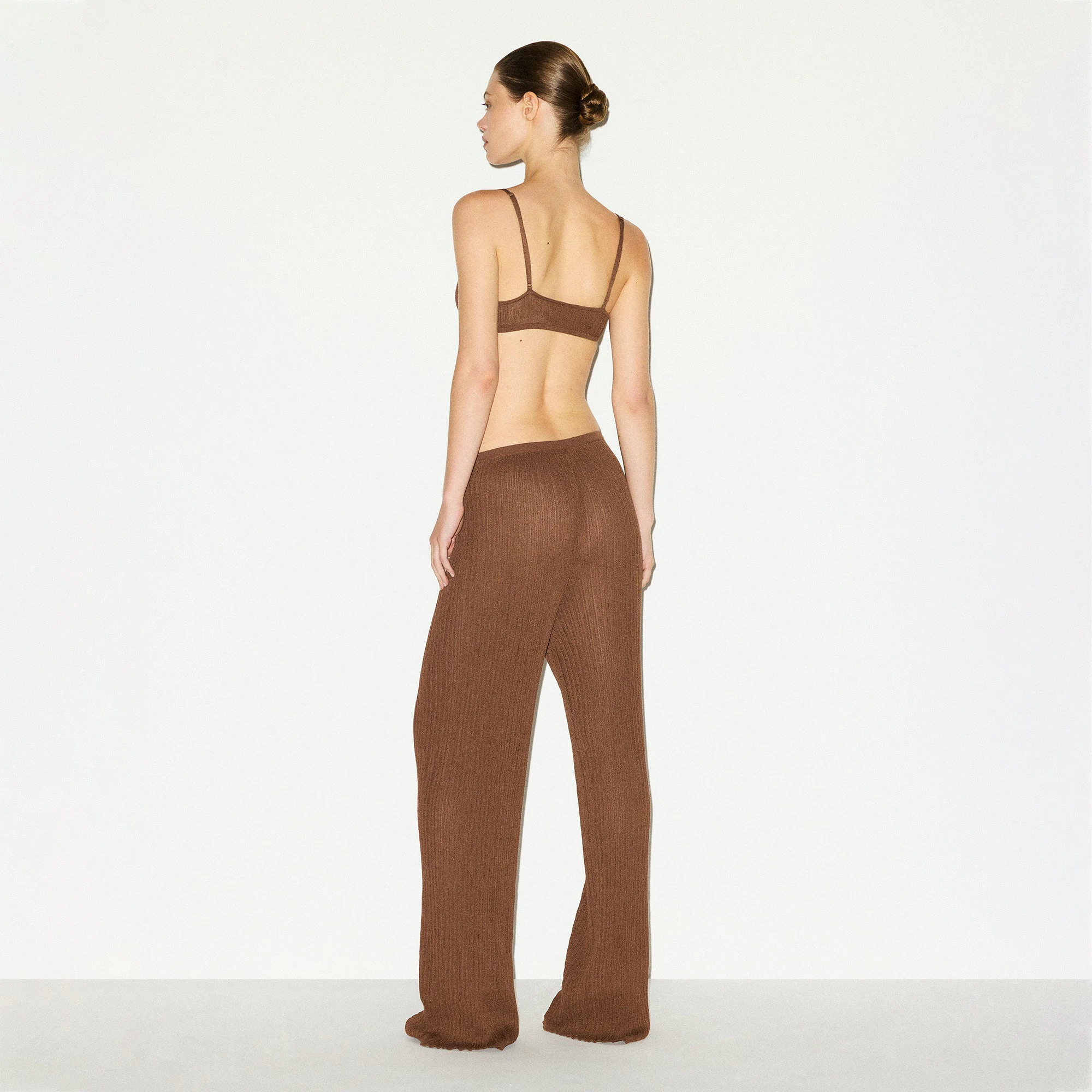 SHEER KNIT STRAIGHT LEG PANT | BISON ON A MODEL BACK VIEW @ | FOCUS: 0.0, 1.0, 0.9