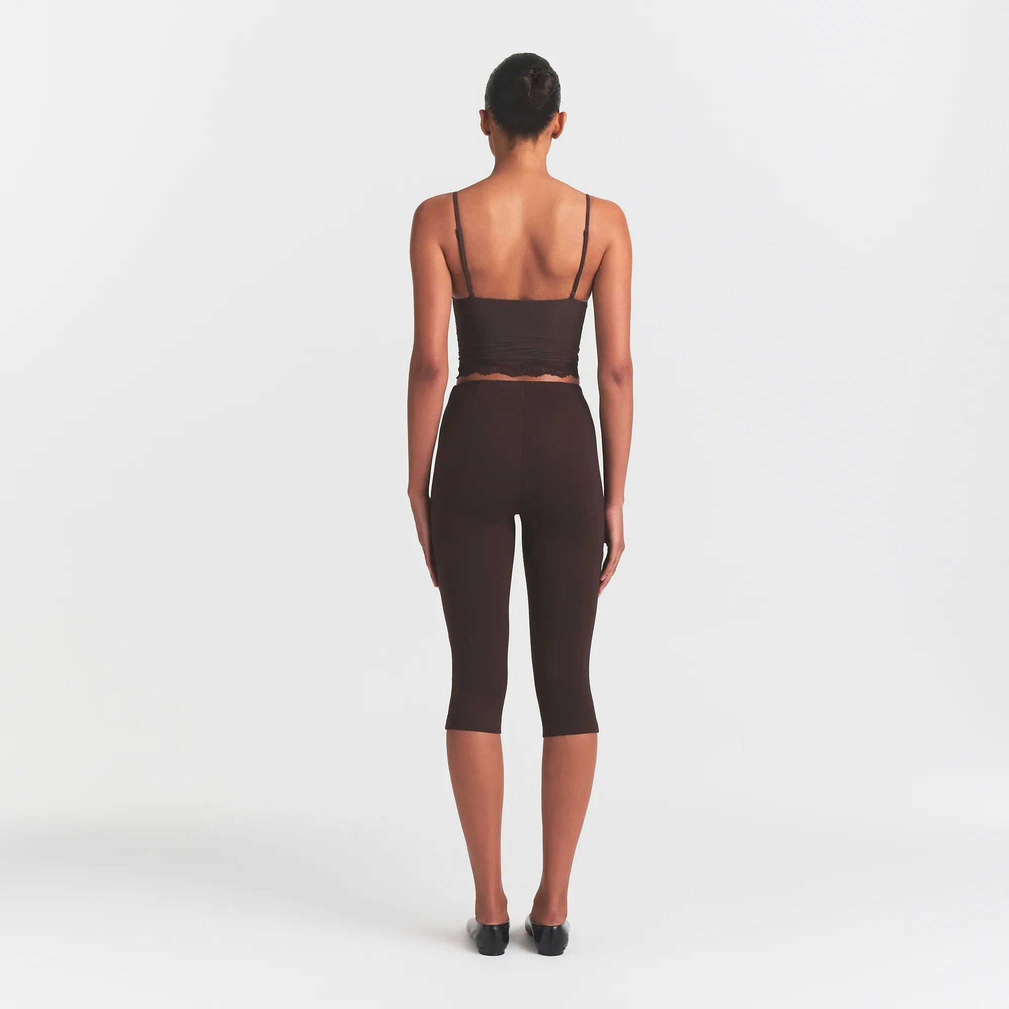 THE ESSENTIAL COLLECTION HIGH-WAISTED CAPRI | ESPRESSO ON A MODEL BACK VIEW @ | FOCUS: 0.0, 1.0, 0.9