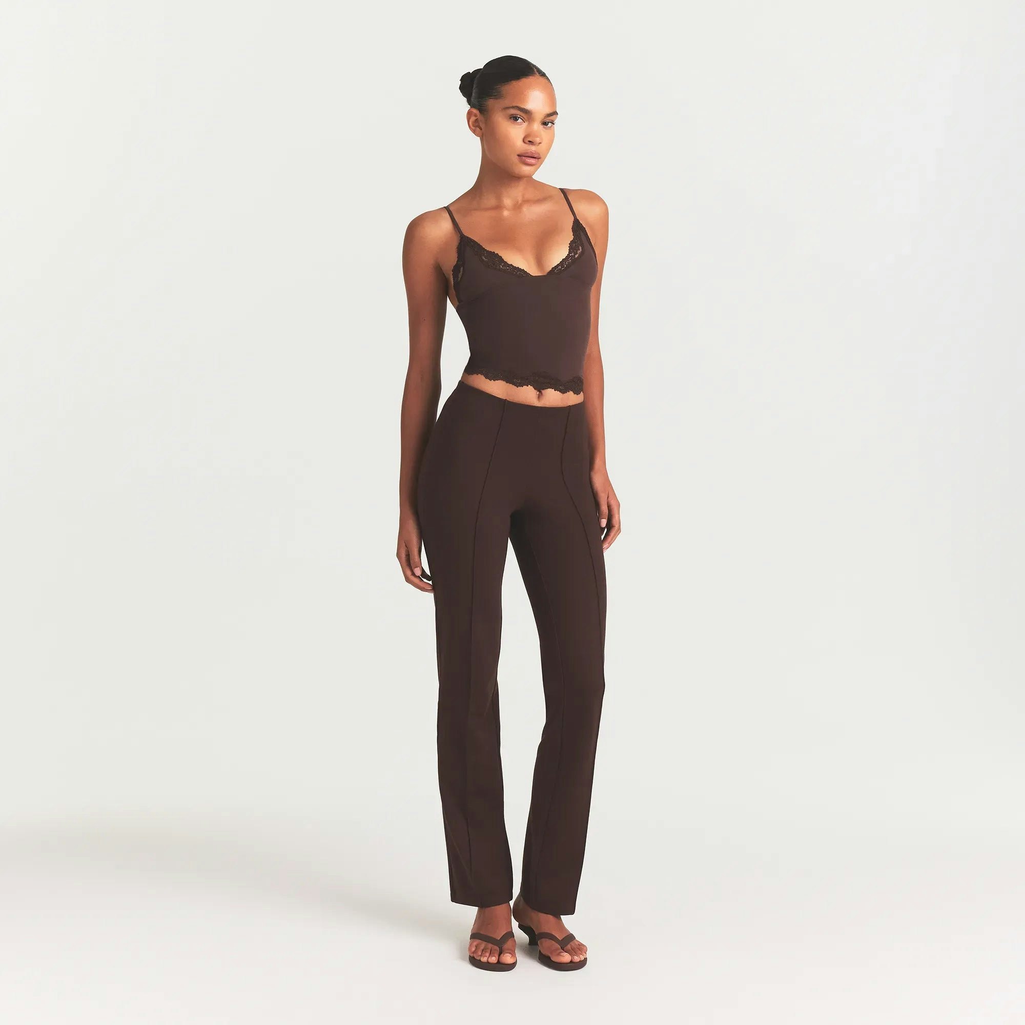 THE ESSENTIAL COLLECTION HIGH-WAISTED PINTUCK STRAIGHT PANT | ESPRESSO ON A MODEL FRONT VIEW @ | FOCUS: 0.0, 1.0, 0.9 