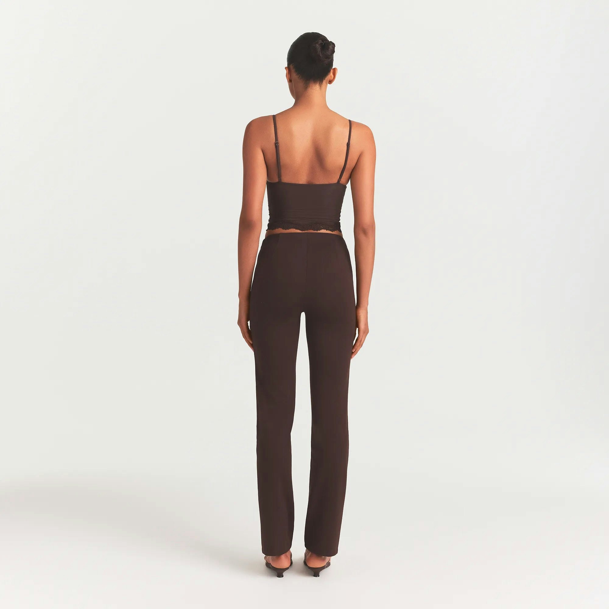 THE ESSENTIAL COLLECTION HIGH-WAISTED PINTUCK STRAIGHT PANT | ESPRESSO ON A MODEL BACK VIEW @ | FOCUS: 0.0, 1.0, 0.9 