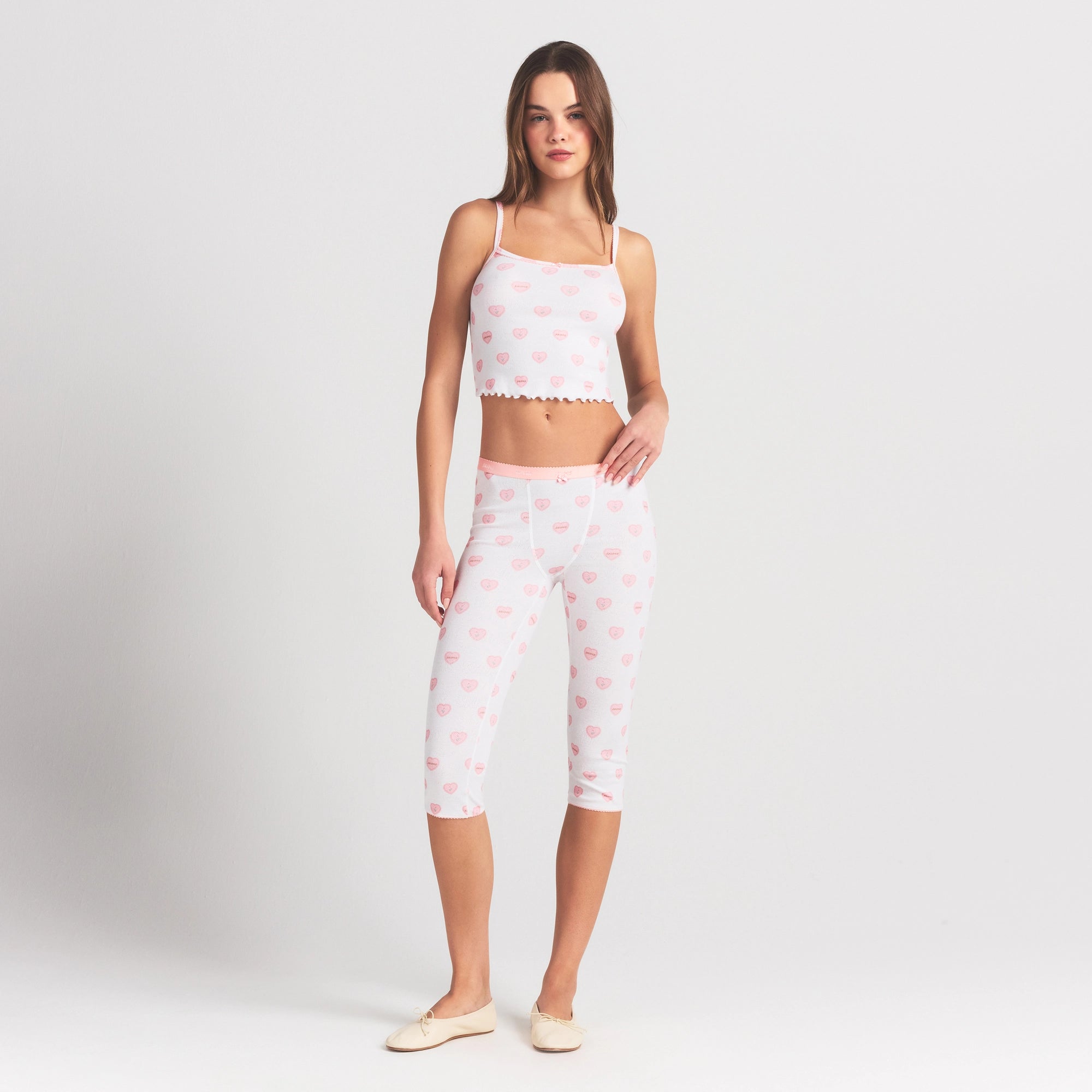 LOGO POINTELLE CAPRI | SNOW LACE HEARTS ON A MODEL FRONT VIEW @ | FOCUS: 0.0, 1.0, 0.9