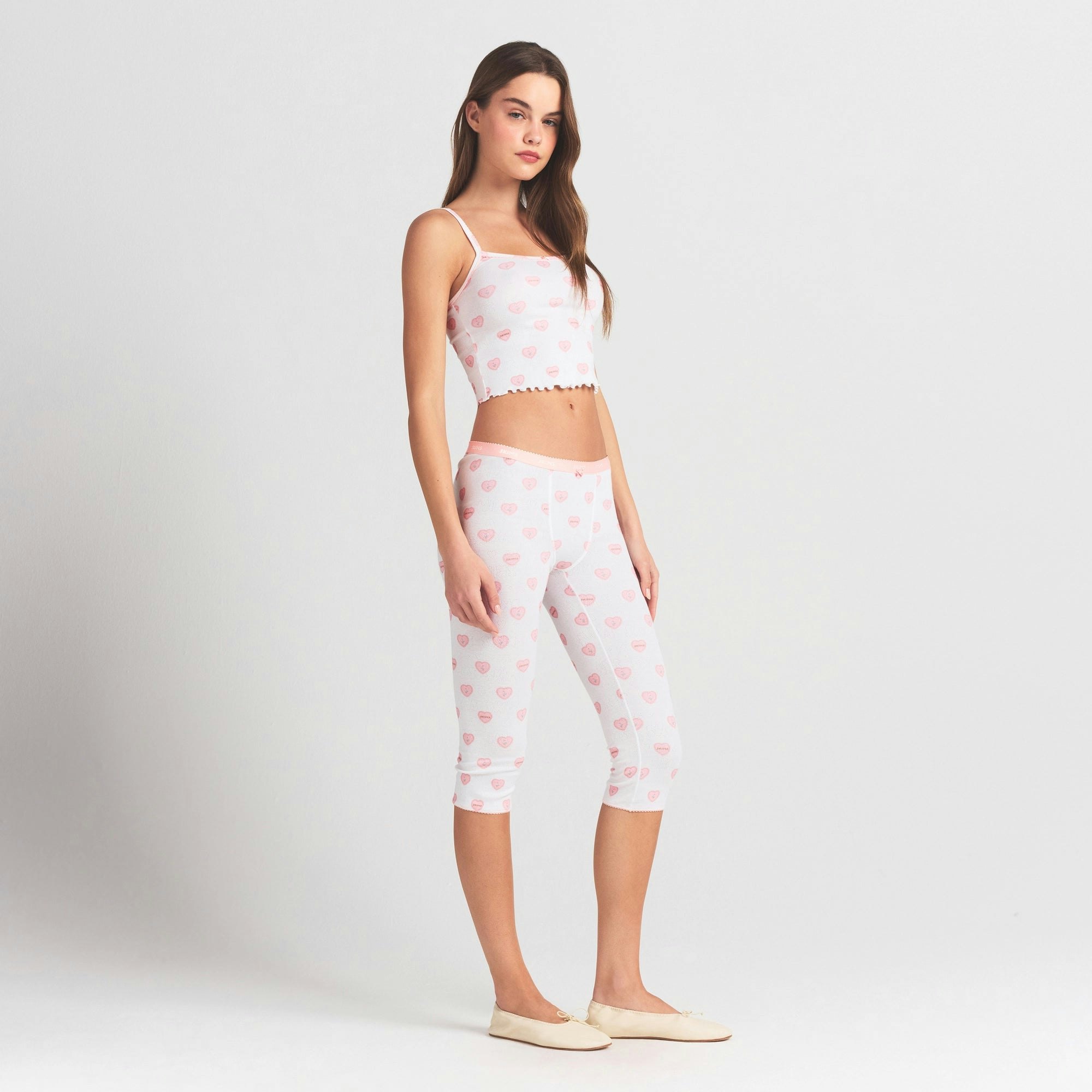 LOGO POINTELLE CAPRI | SNOW LACE HEARTS ON A MODEL FRONT VIEW @ | FOCUS: 0.0, 1.0, 0.9