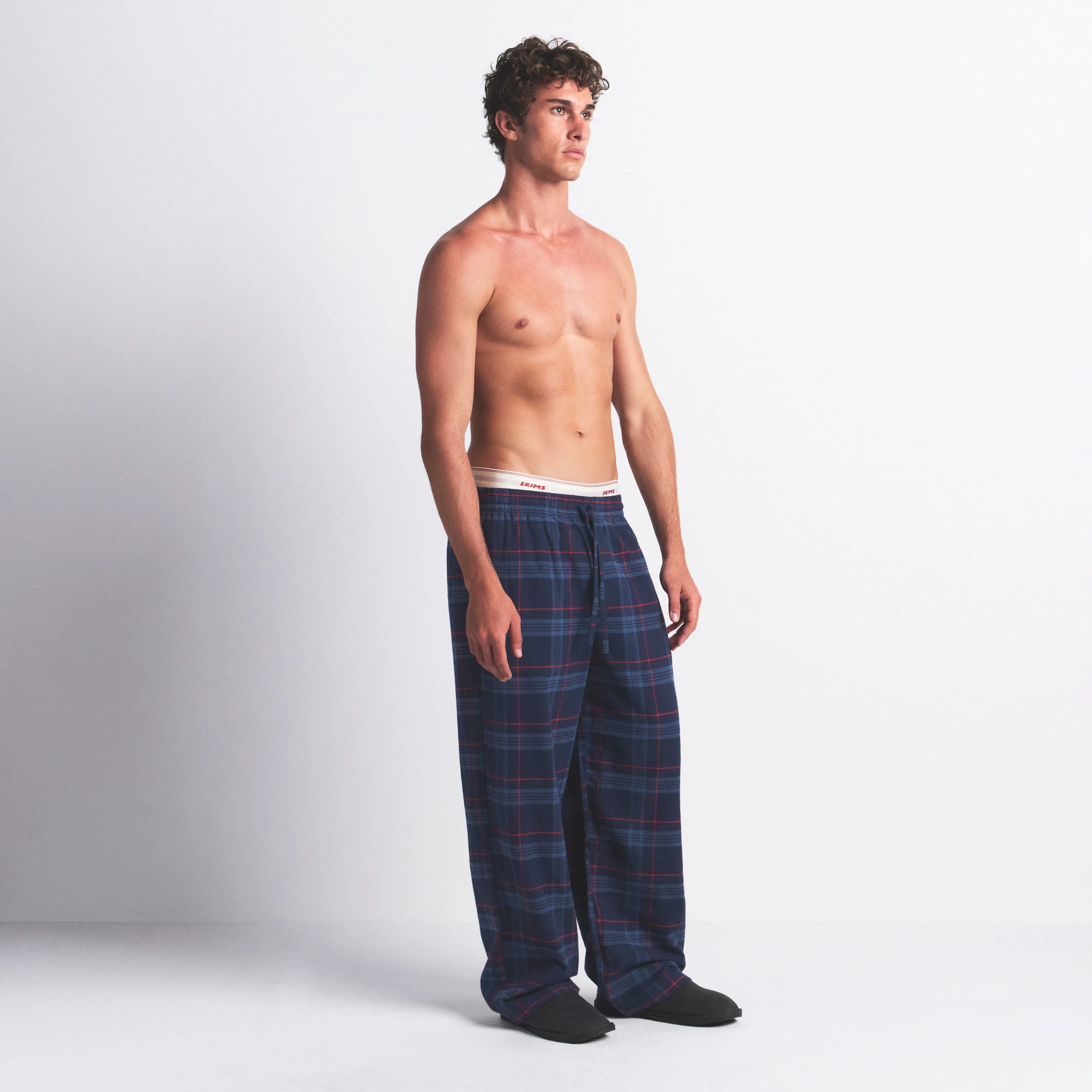 FLANNEL SLEEP MENS PANT | DAMSON LASER PLAID ON A MODEL SIDE VIEW @ | FOCUS: 0.0, 1.0, 0.9