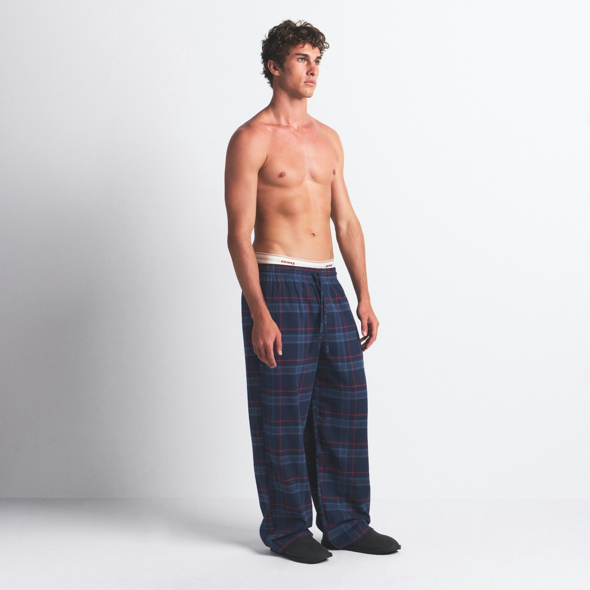 FLANNEL SLEEP MENS PANT | DAMSON LASER PLAID ON A MODEL SIDE VIEW @ | FOCUS: 0.0, 1.0, 0.9